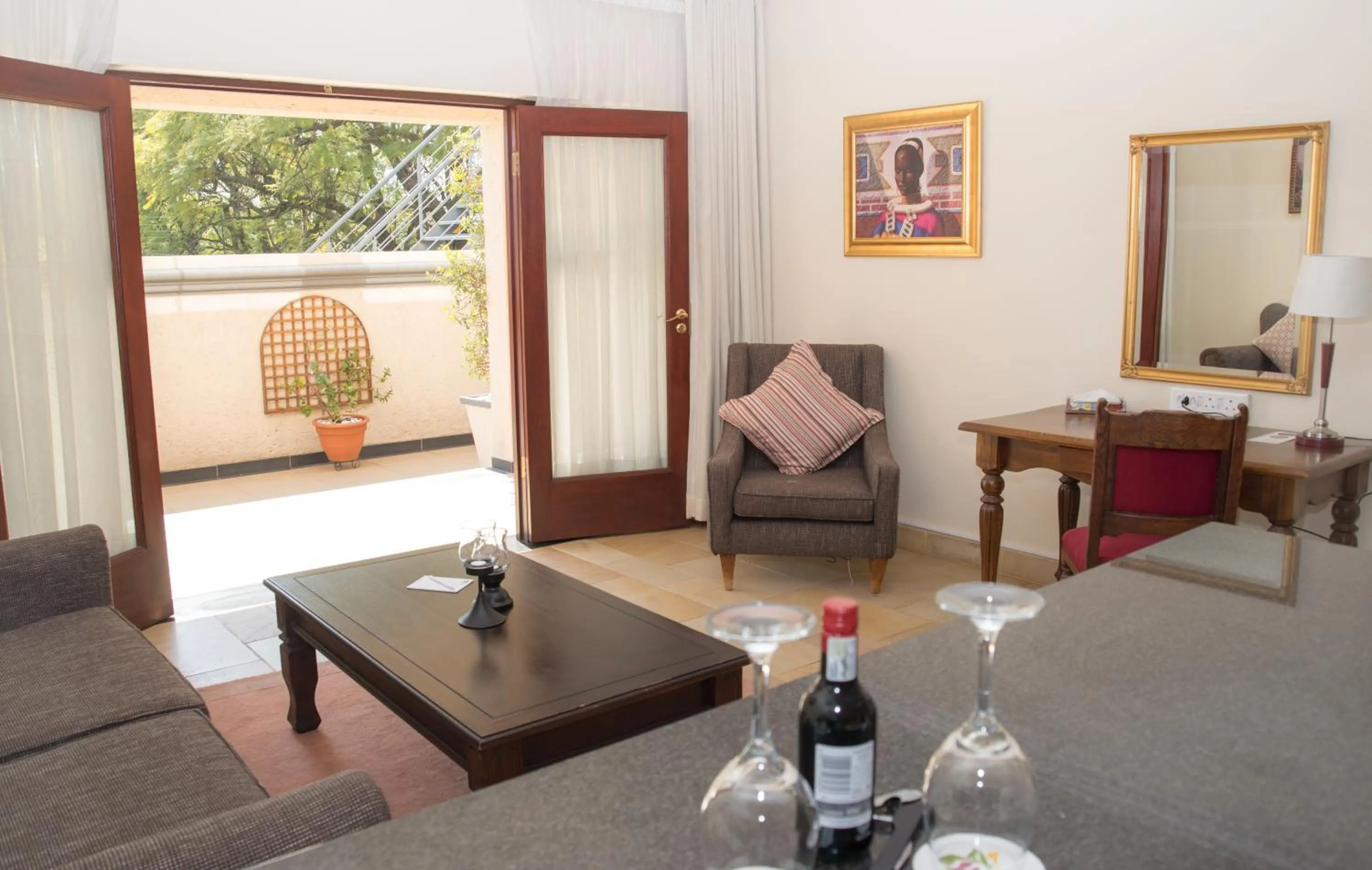 Seating area in Gardenia Boutique Hotel