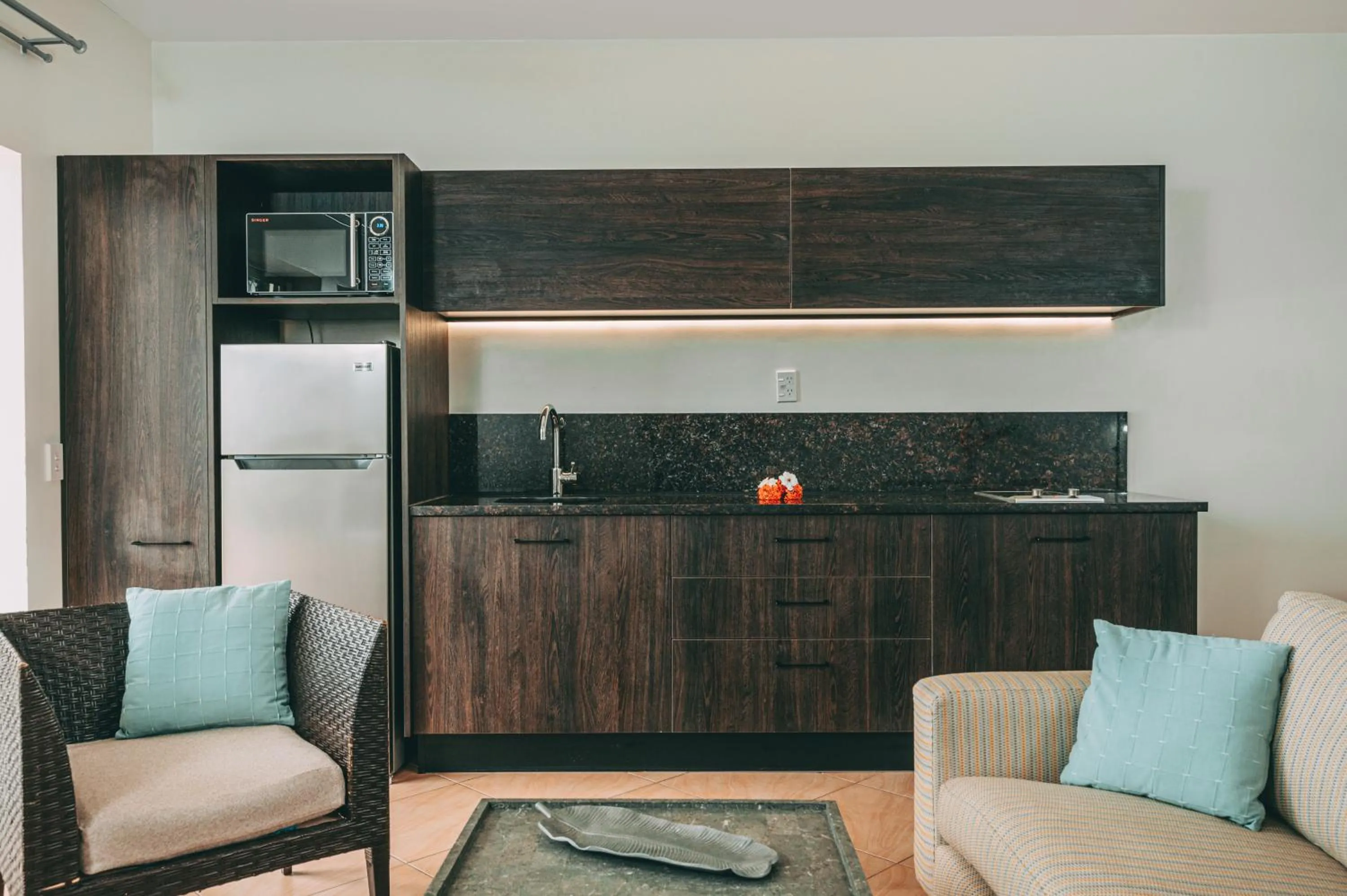 Kitchen or kitchenette in Moana Sands Villas & Apartments