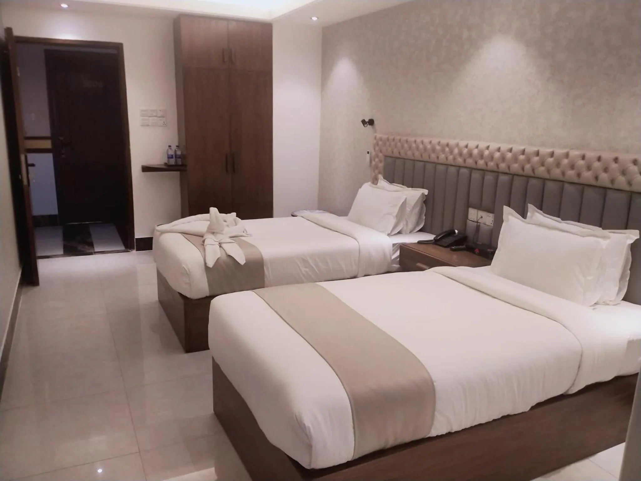 Bed in The Tayef Residency