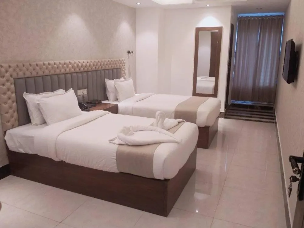 Bed in The Tayef Residency