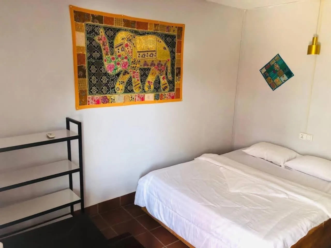 Bed in Kalinga Art Home Guest House