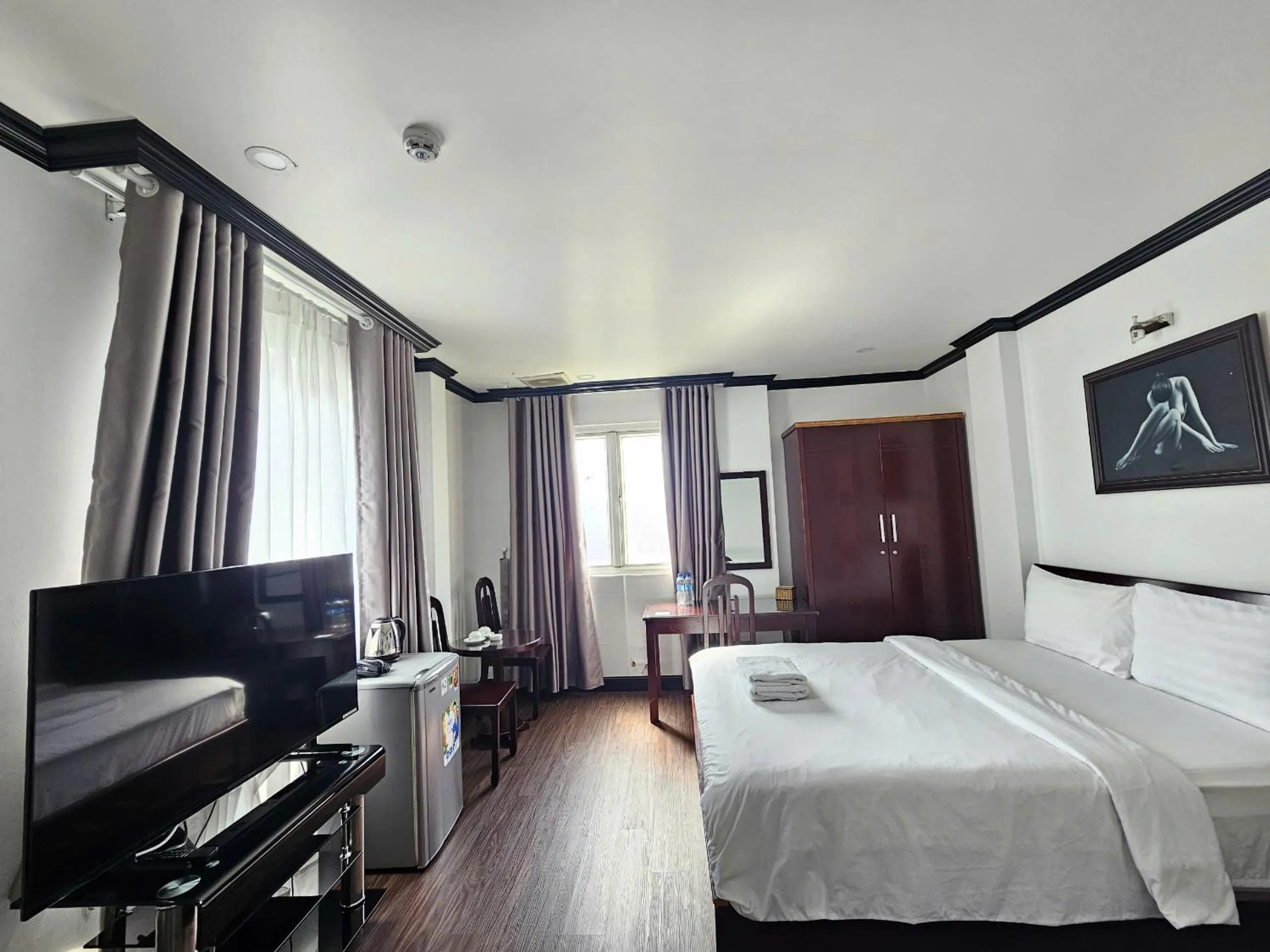 Living room in Hao Tin Hotel Ben Thanh - City Central