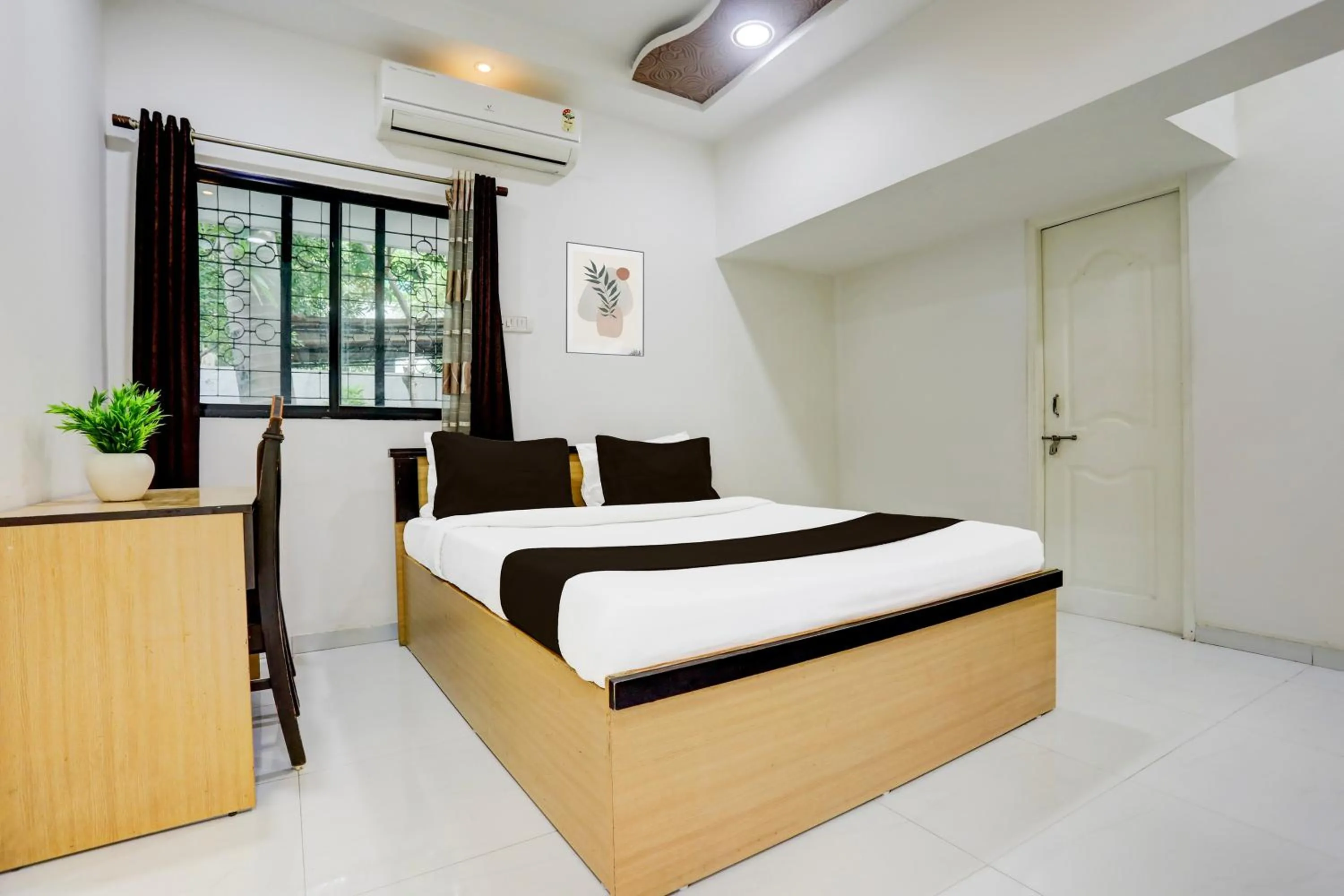 Bedroom in Hotel O GREEN PALMS