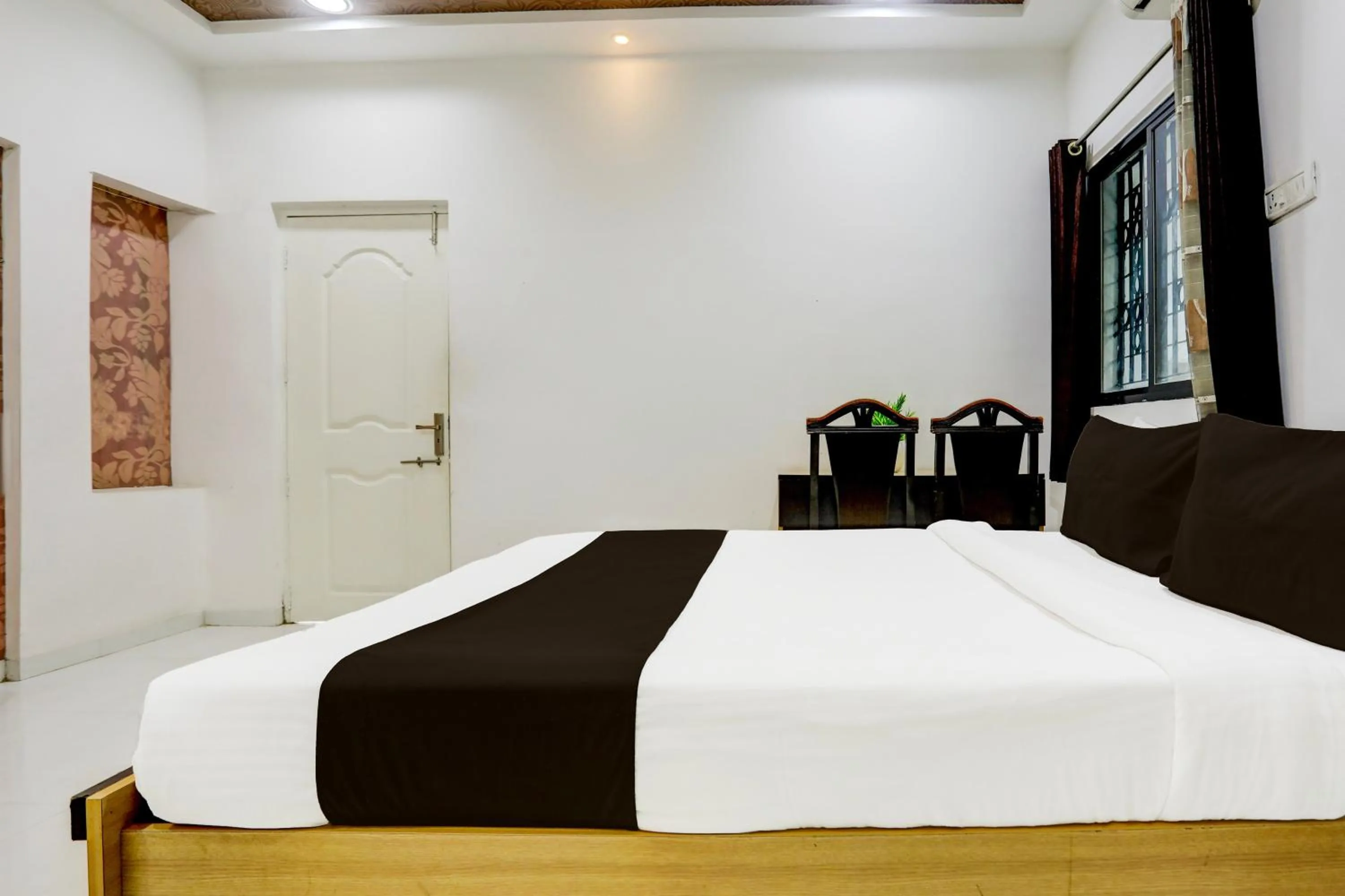 Bedroom in Hotel O GREEN PALMS