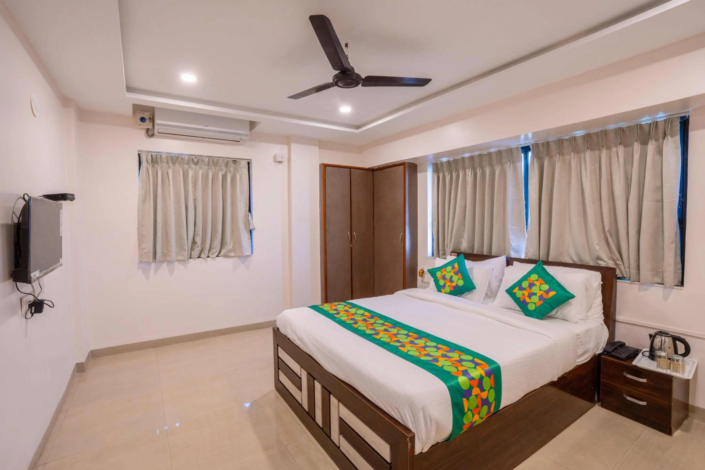 Bedroom, Bed in Treebo Royal Comfort Atithi