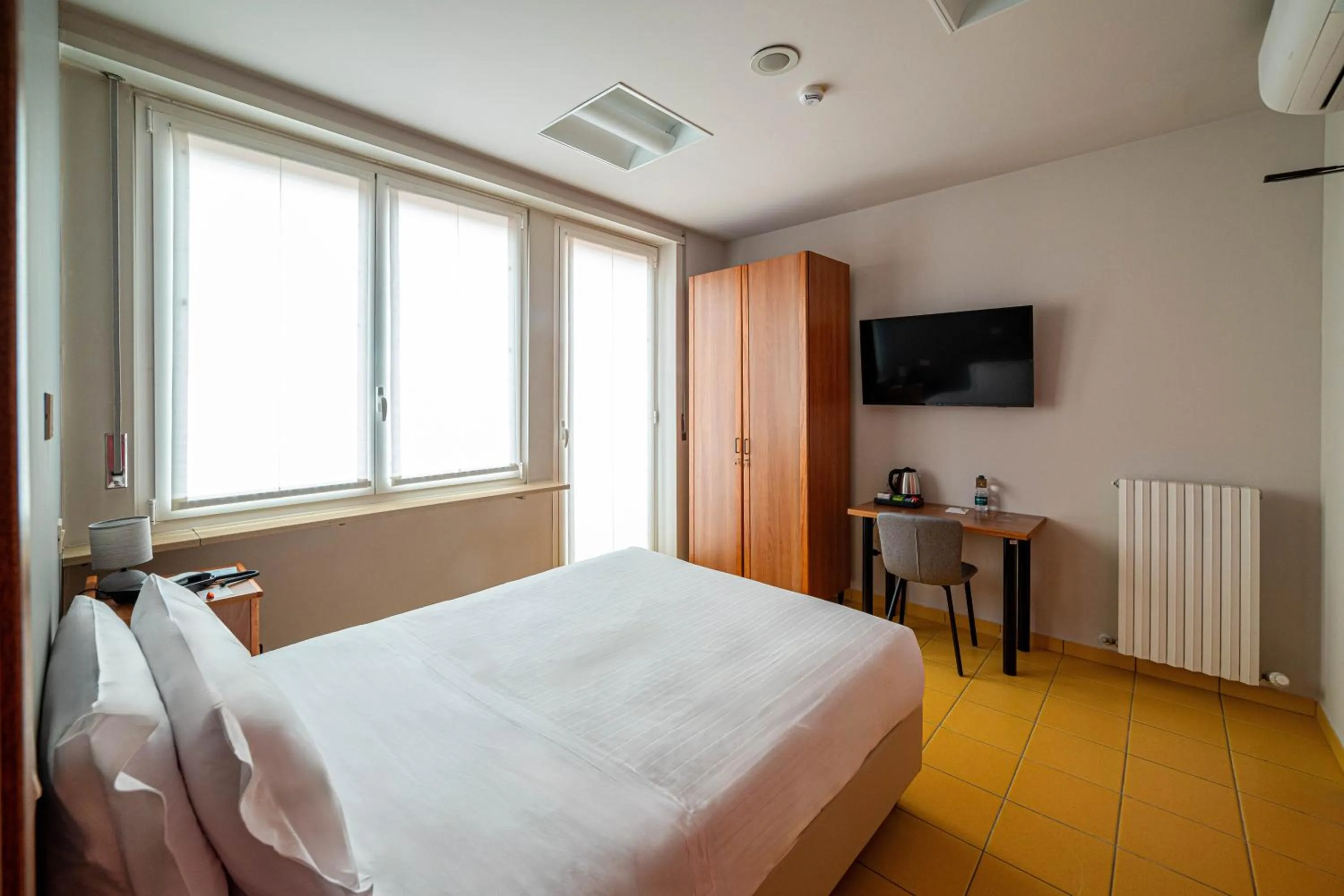 Photo of the whole room, Bed in Phi Hotel Homy Druento