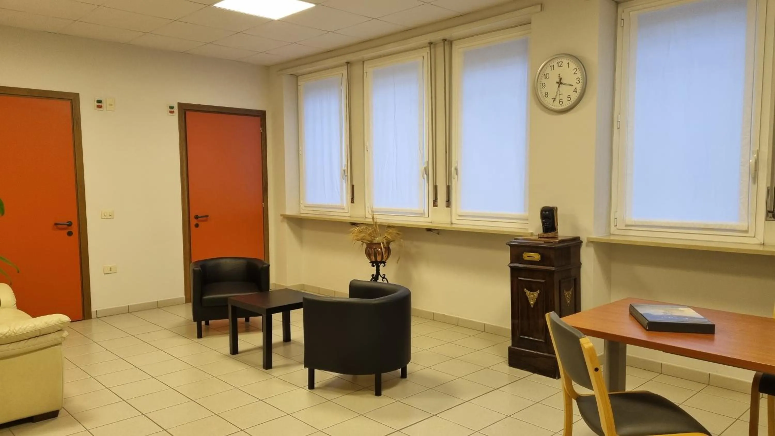 Communal lounge/ TV room in Phi Hotel Homy Druento