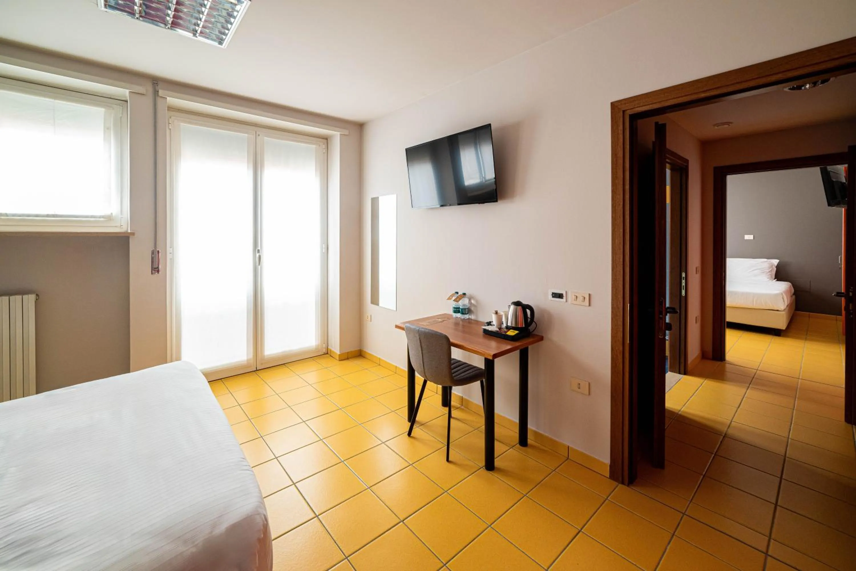 Photo of the whole room, Bed in Phi Hotel Homy Druento