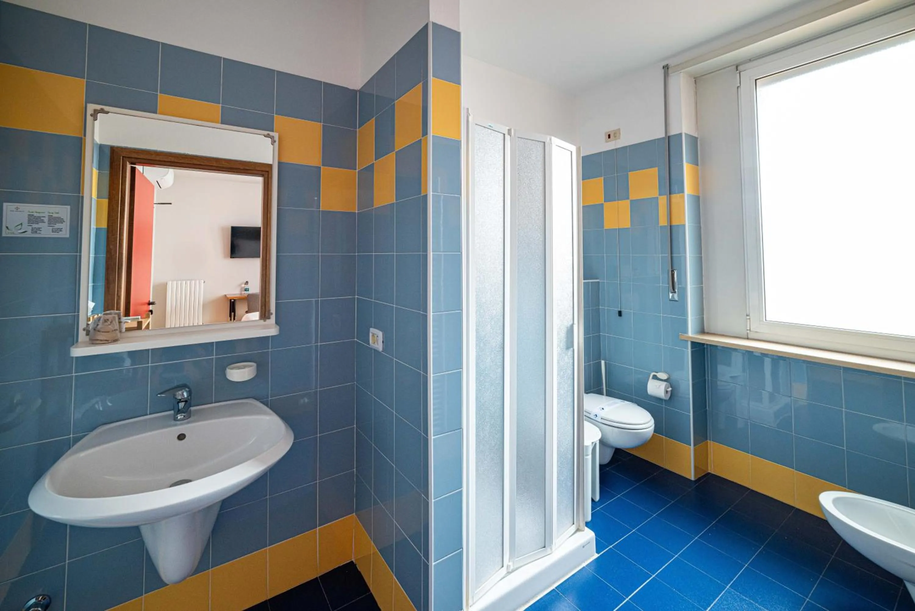 Photo of the whole room in Phi Hotel Homy Druento