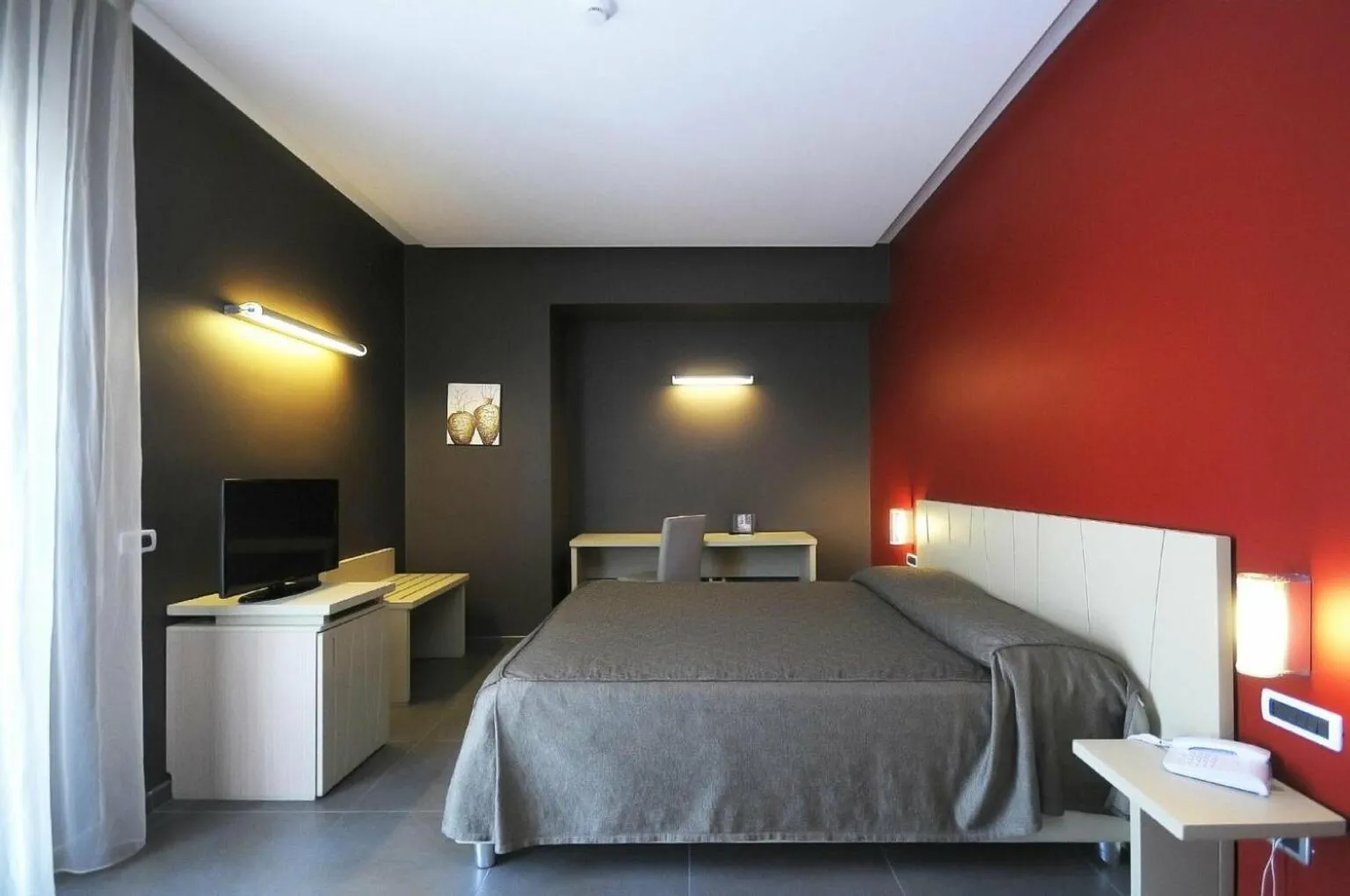 Bed in Sunrise Hotel