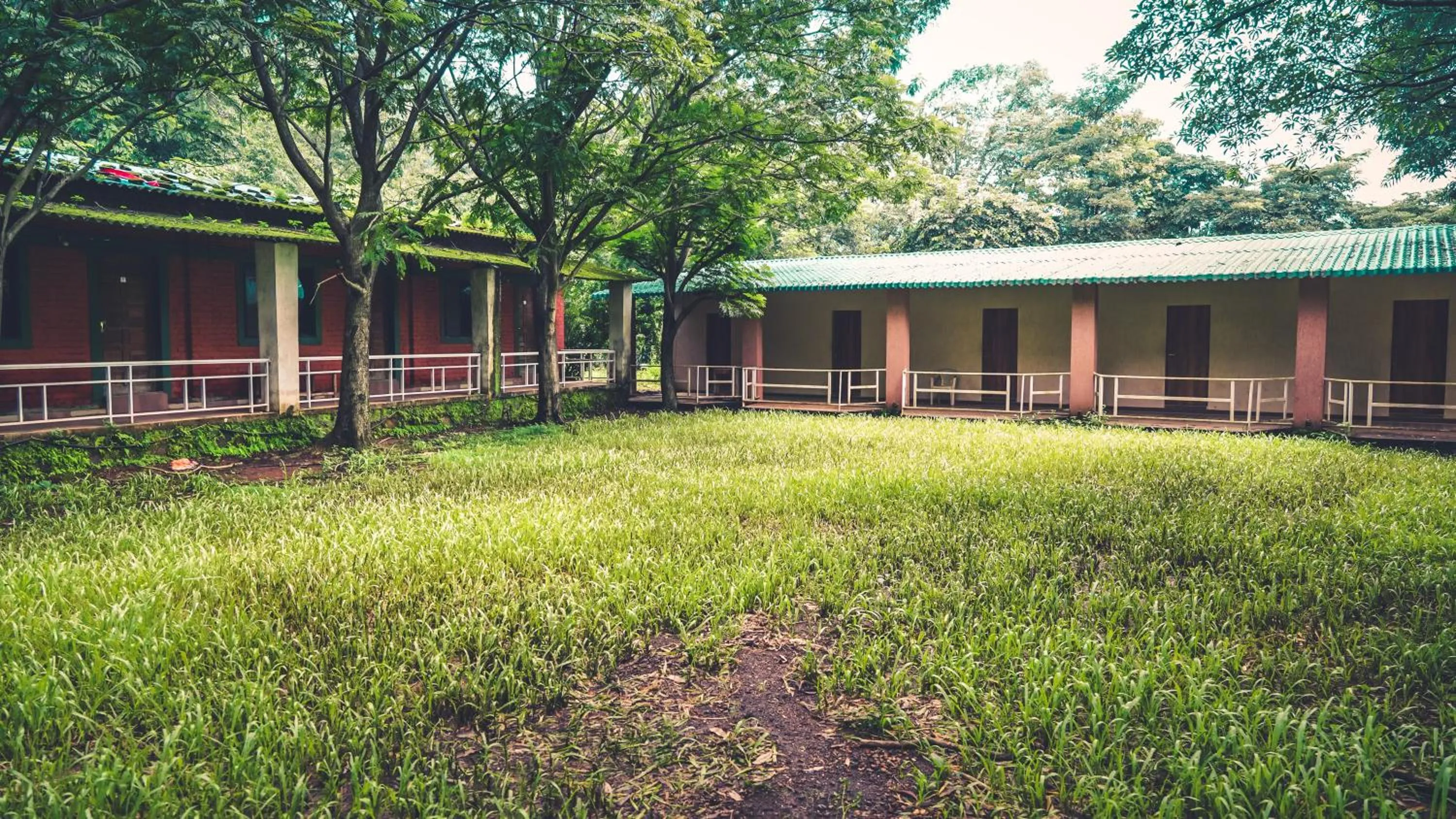 Property building in Whispering Peepul Resort