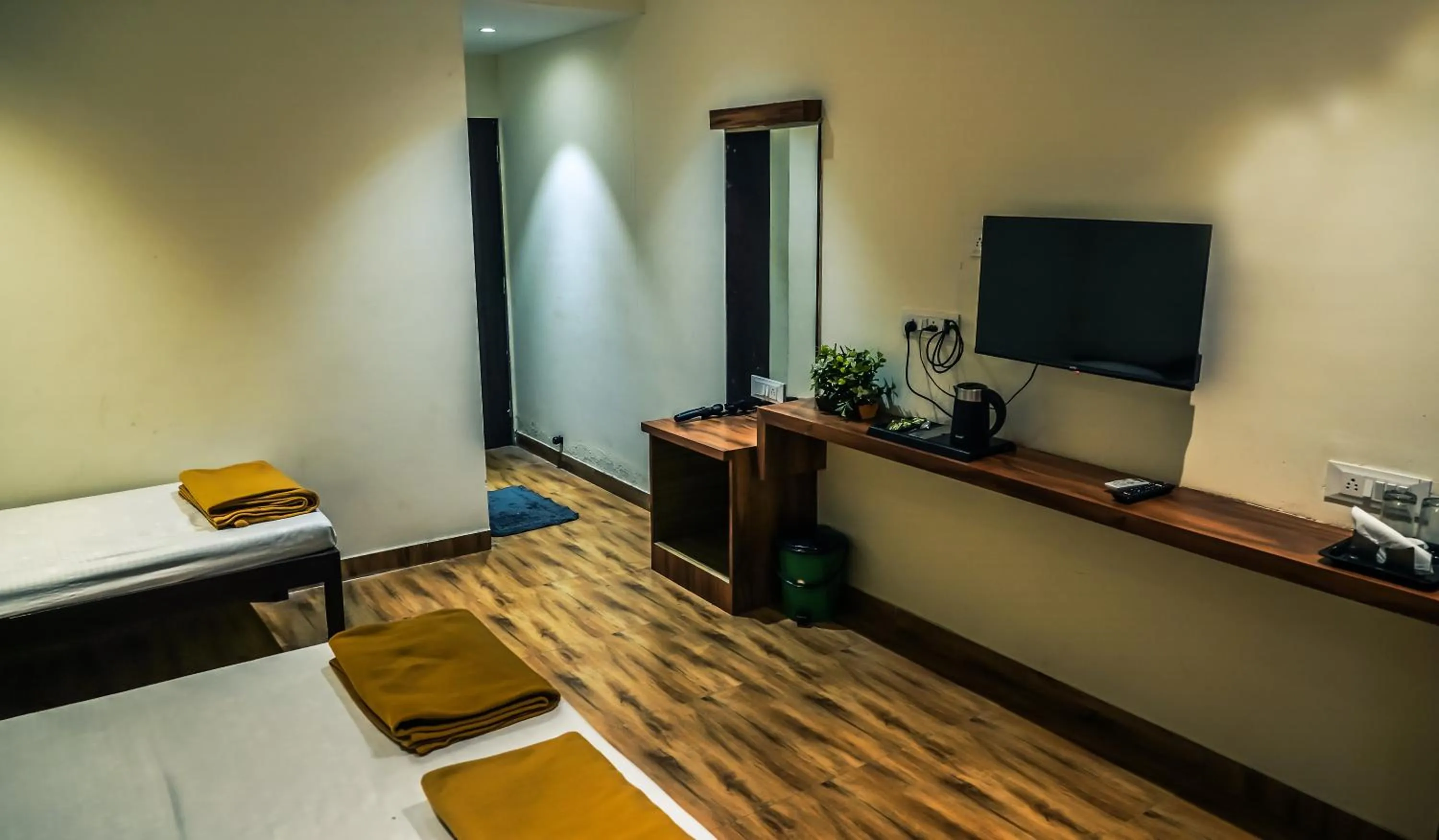 Bed in Whispering Peepul Resort