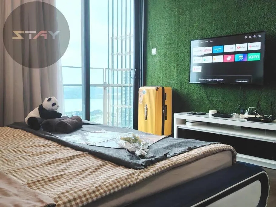 Bed in Almas Suites Cozy King Bed Studio Netflix By STAY