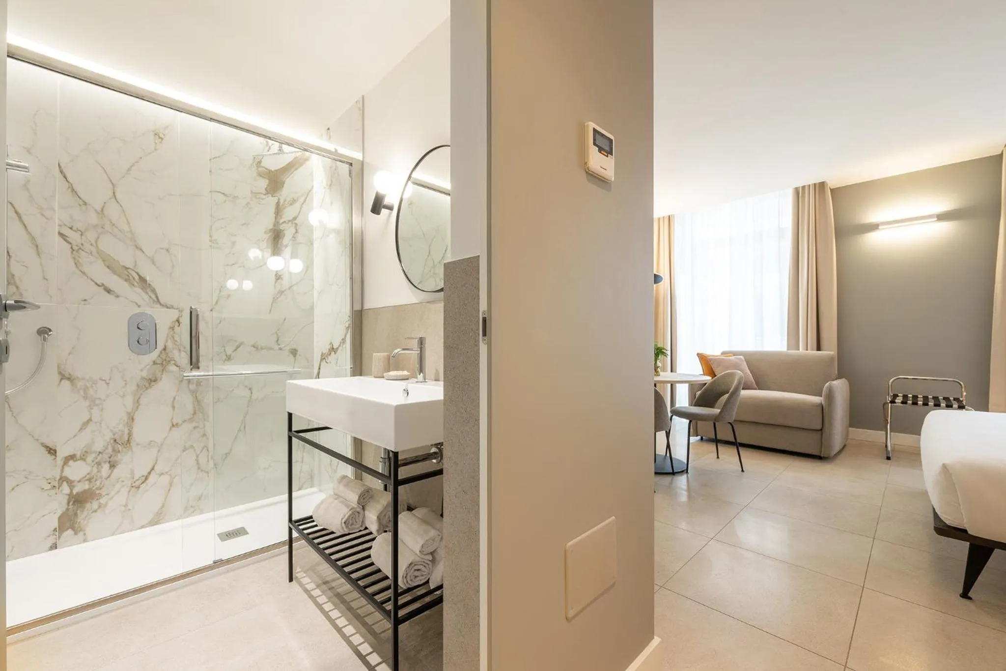 Photo of the whole room, Bed in Karalin Sonnino Suites