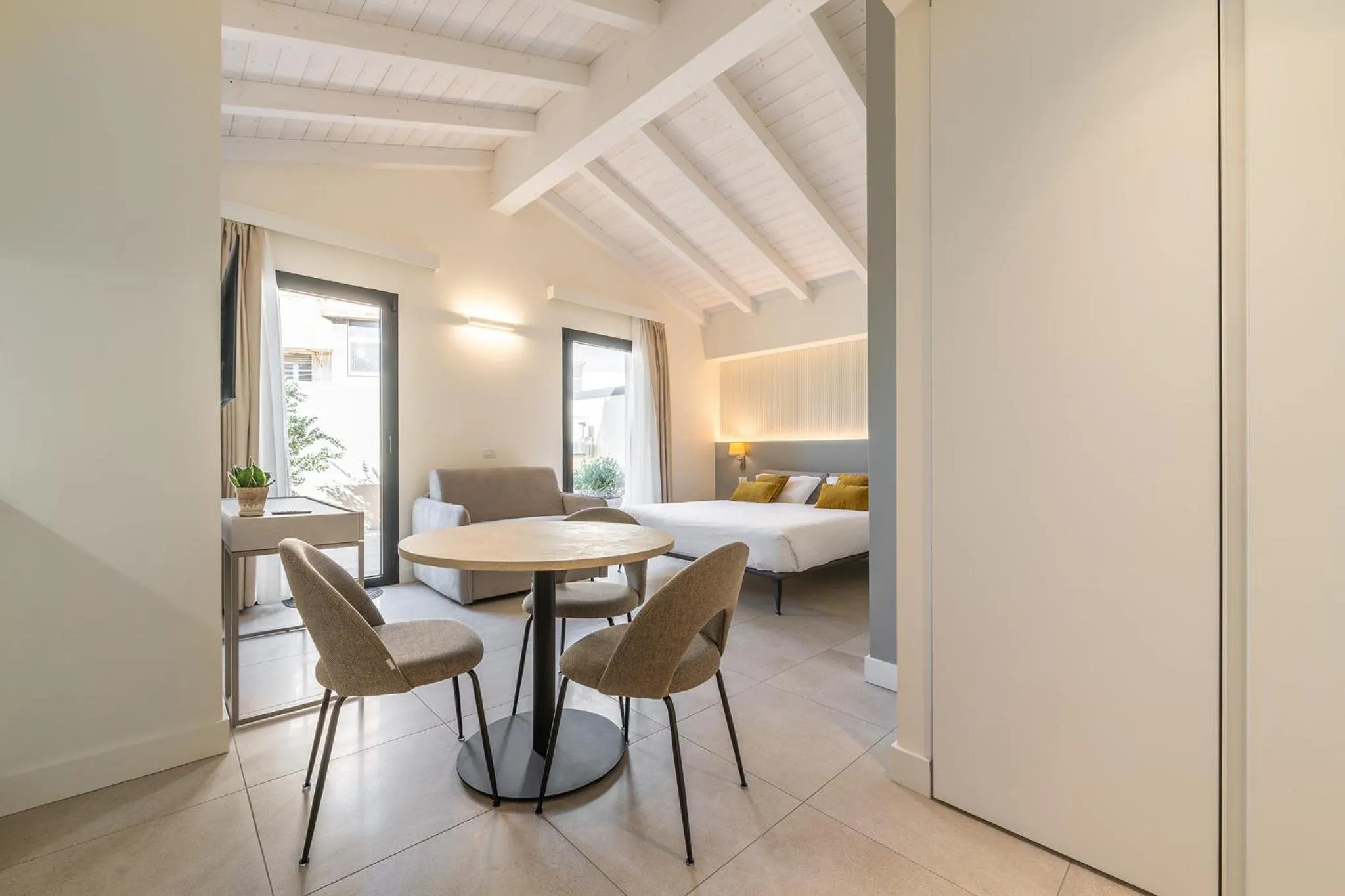 Photo of the whole room, Bed in Karalin Sonnino Suites