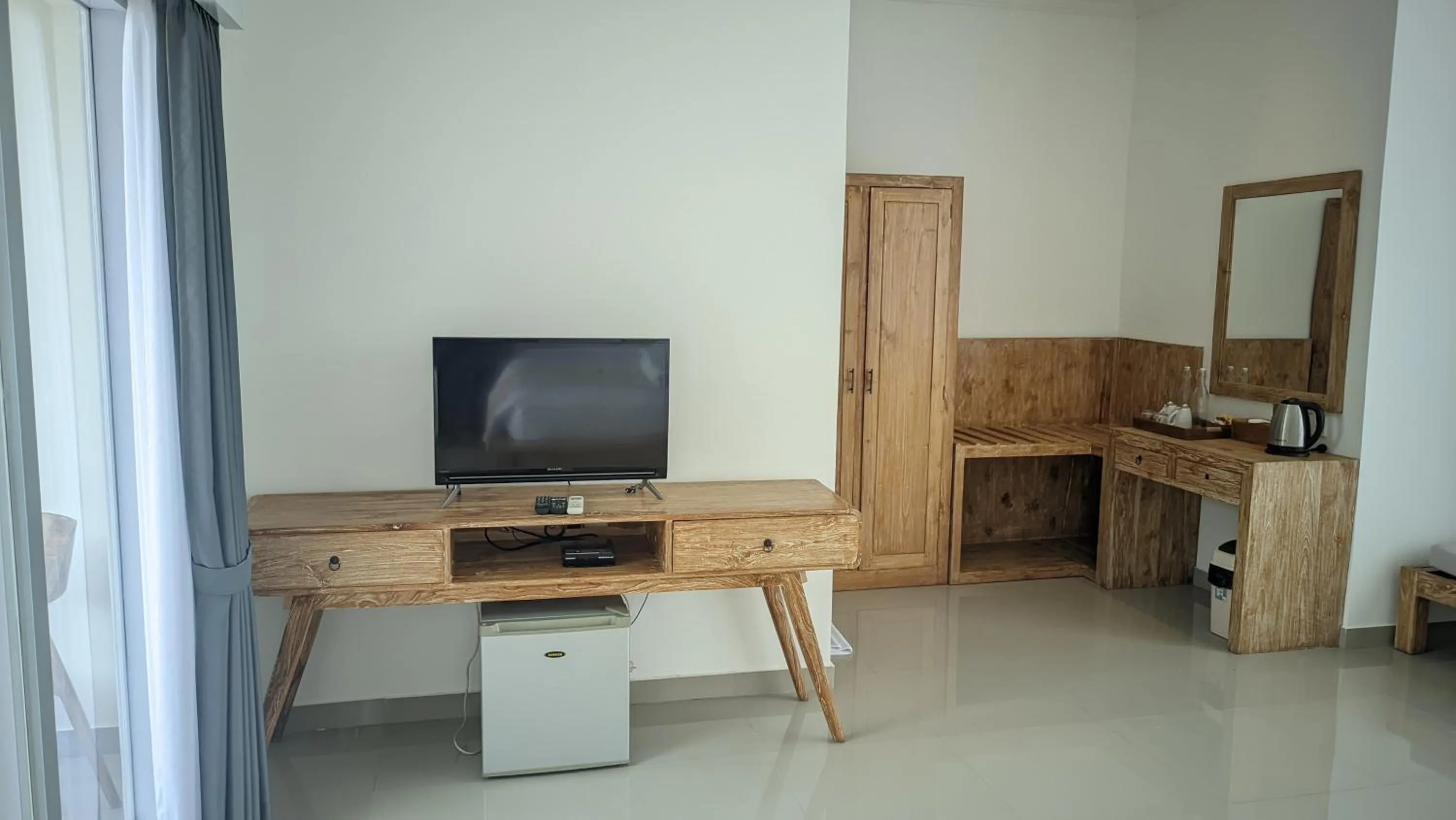 TV and multimedia in Sujiwa Ubud Hotel & Villa