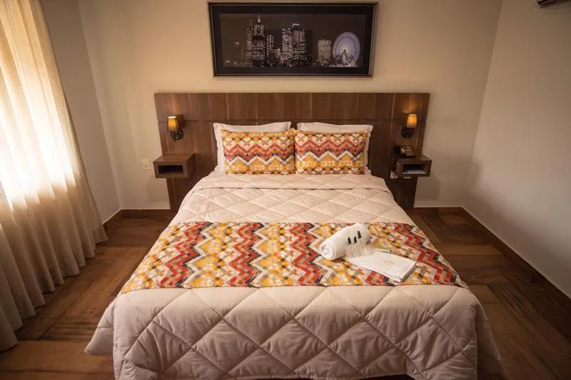 Bed in Padom Business Hotel