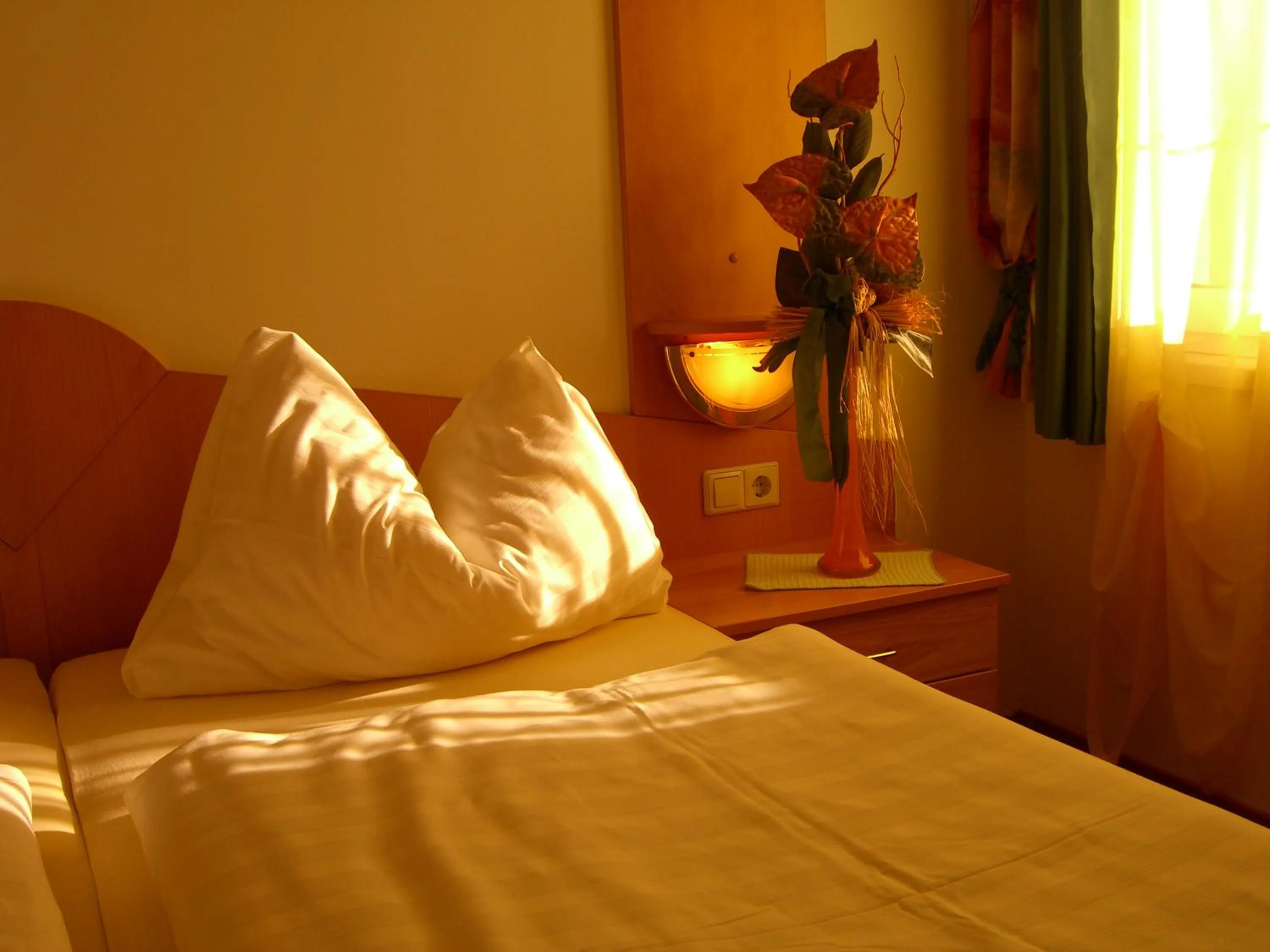 Bedroom, Bed in LiebesNesterl Bergwirt - Boutique Hotel