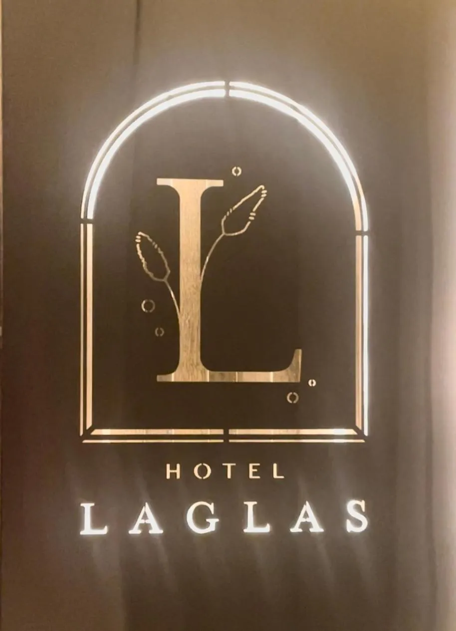 Property logo or sign in Hotel Laglas Asan