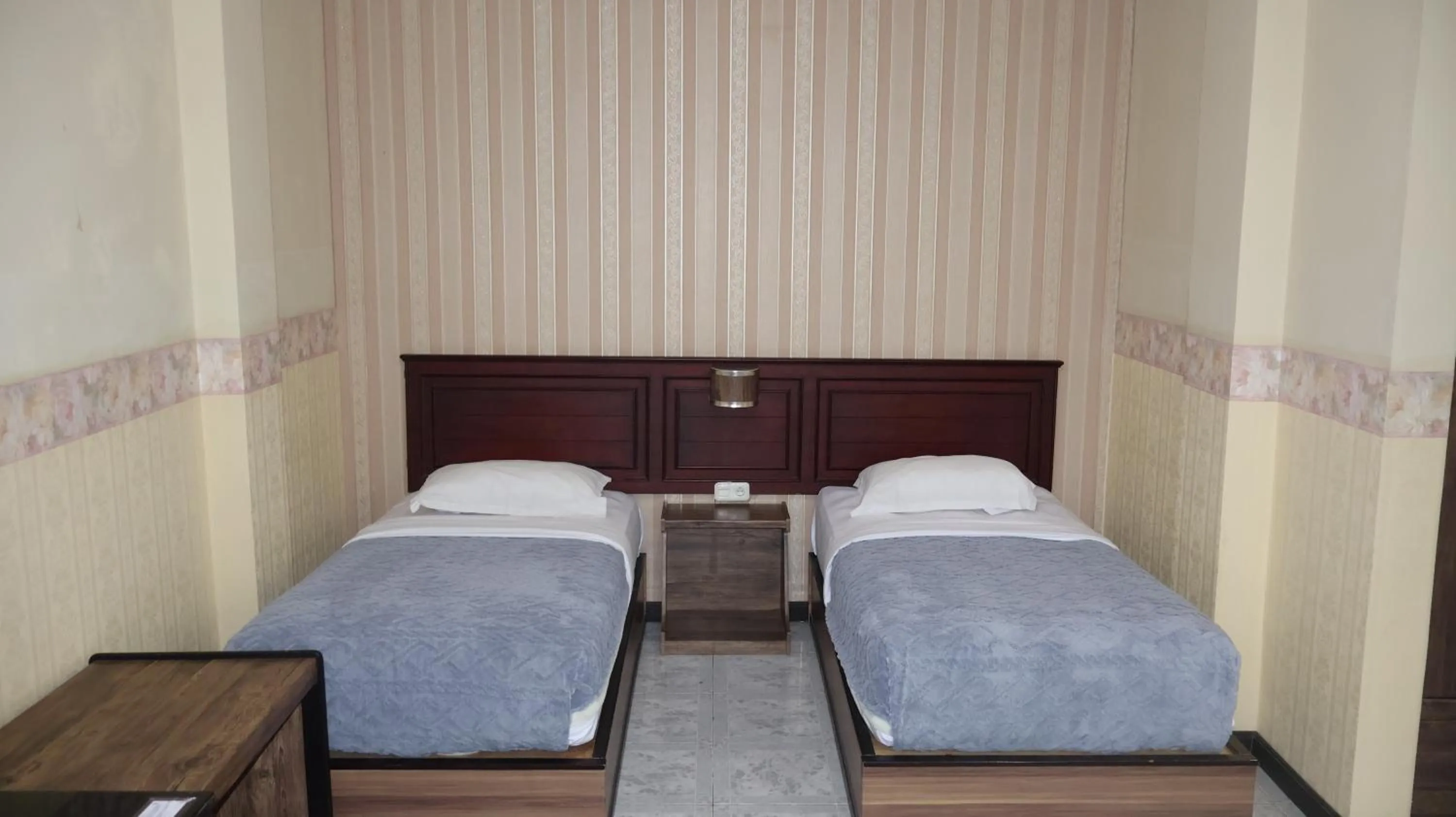 Bed in Nikita Hotel