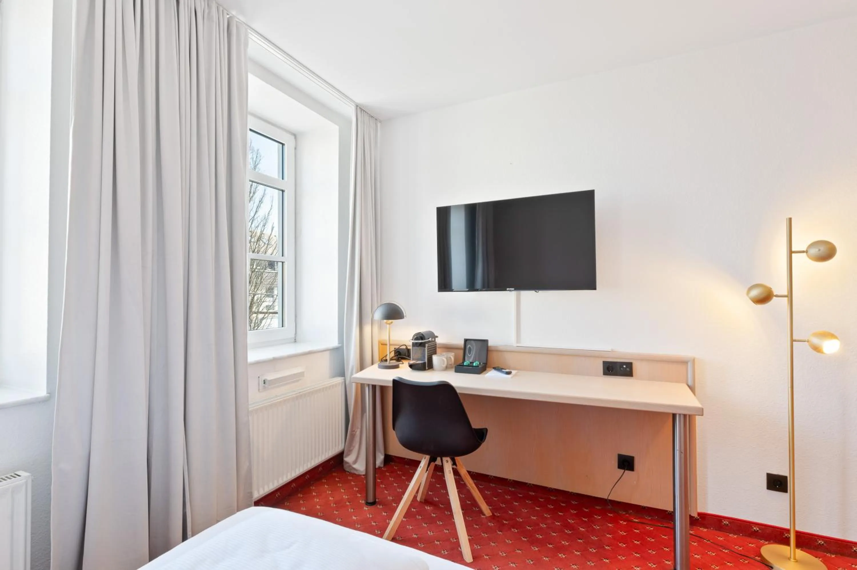 TV and multimedia, Bed in Gästehaus Andrea