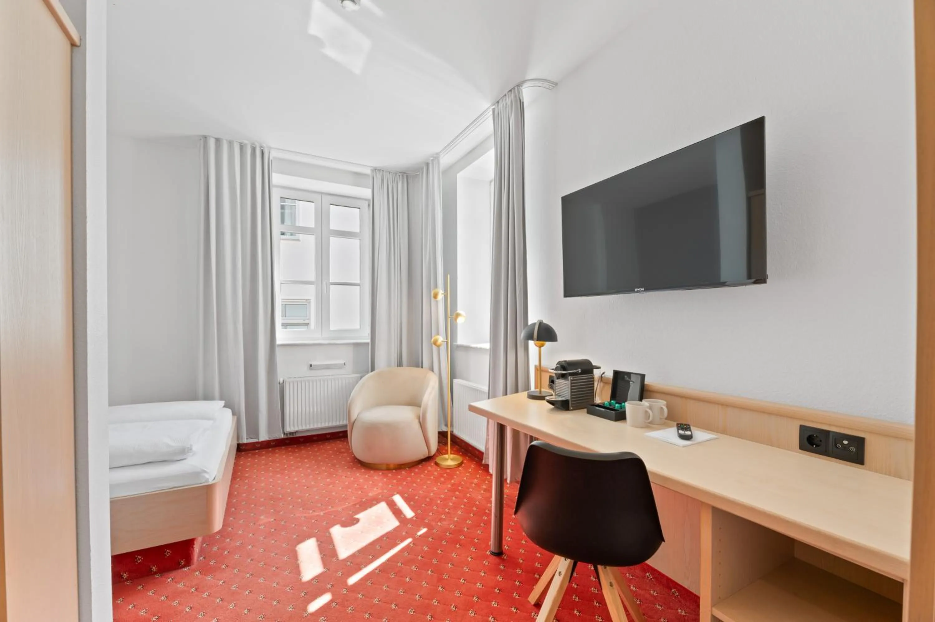 TV and multimedia, Bed in Gästehaus Andrea