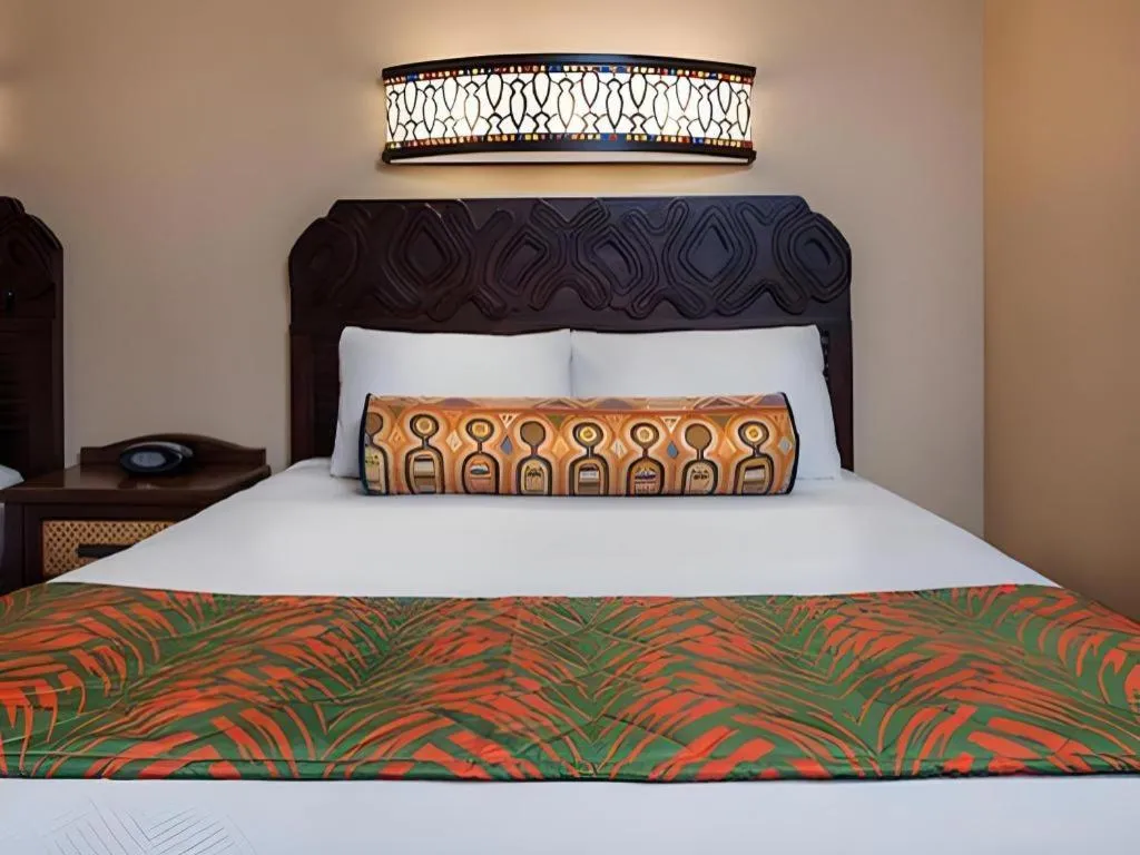 Bed in Disney's Caribbean Beach Resort