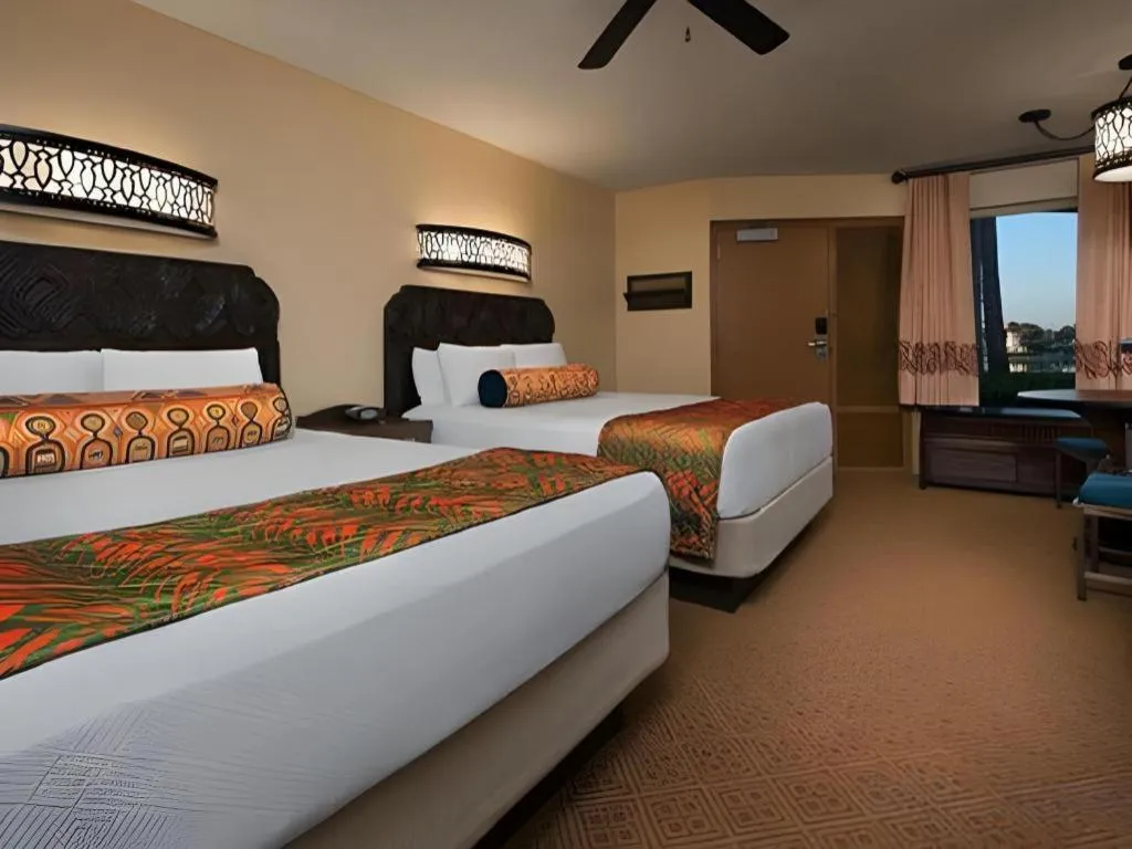 Bed in Disney's Caribbean Beach Resort