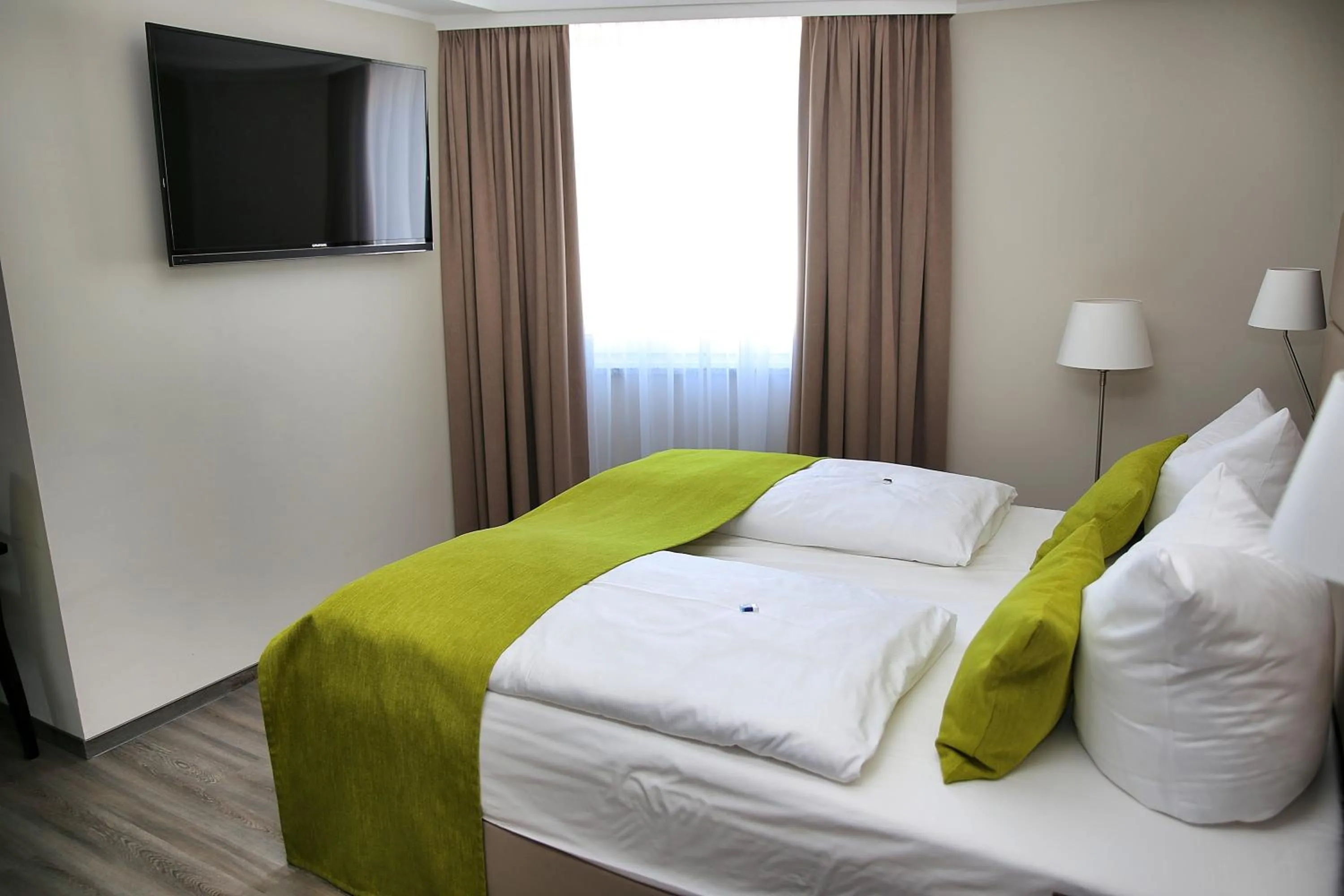 Bedroom, Bed in hotel bomonti Nürnberg West