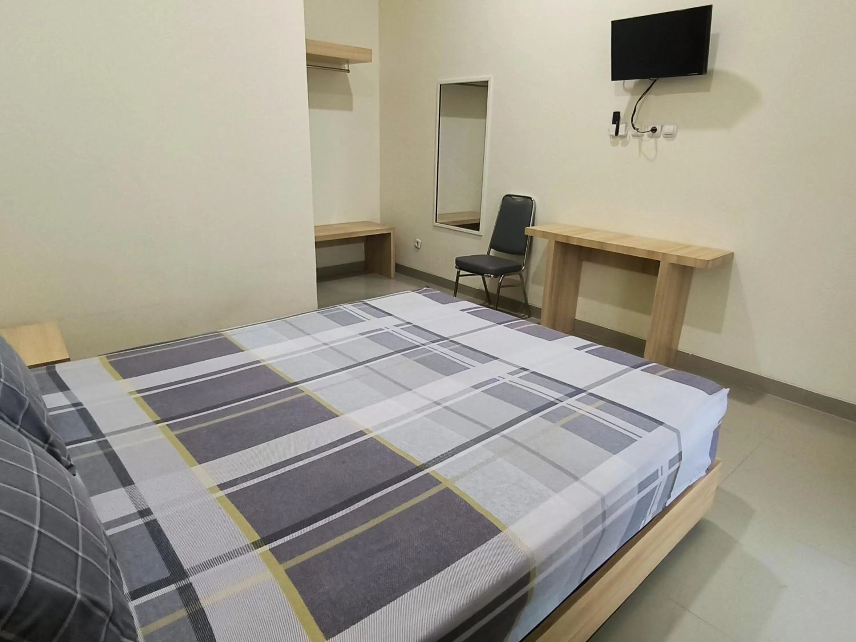 Bed in Tentrem Guesthouse Baru