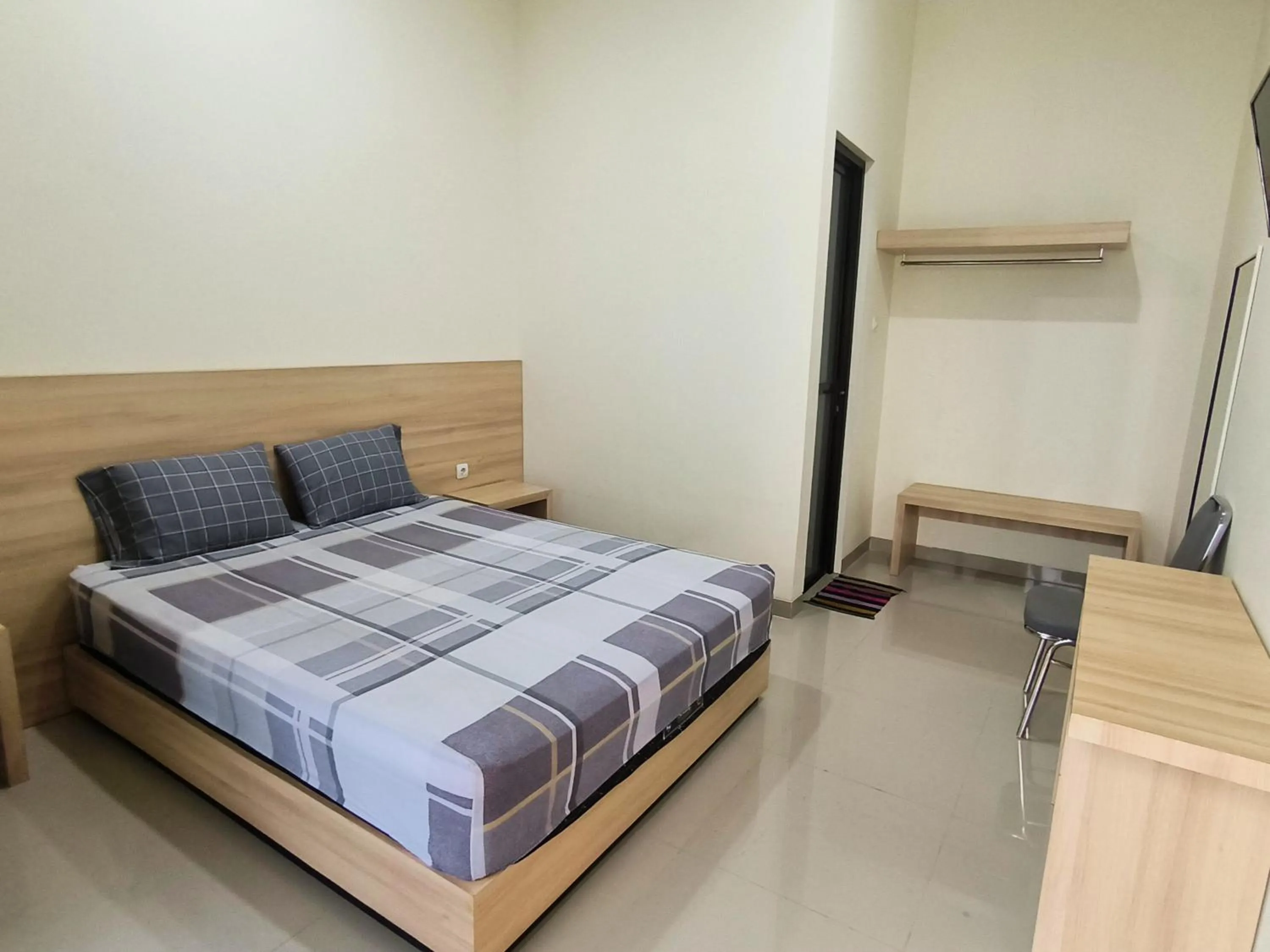 Bed in Tentrem Guesthouse Baru