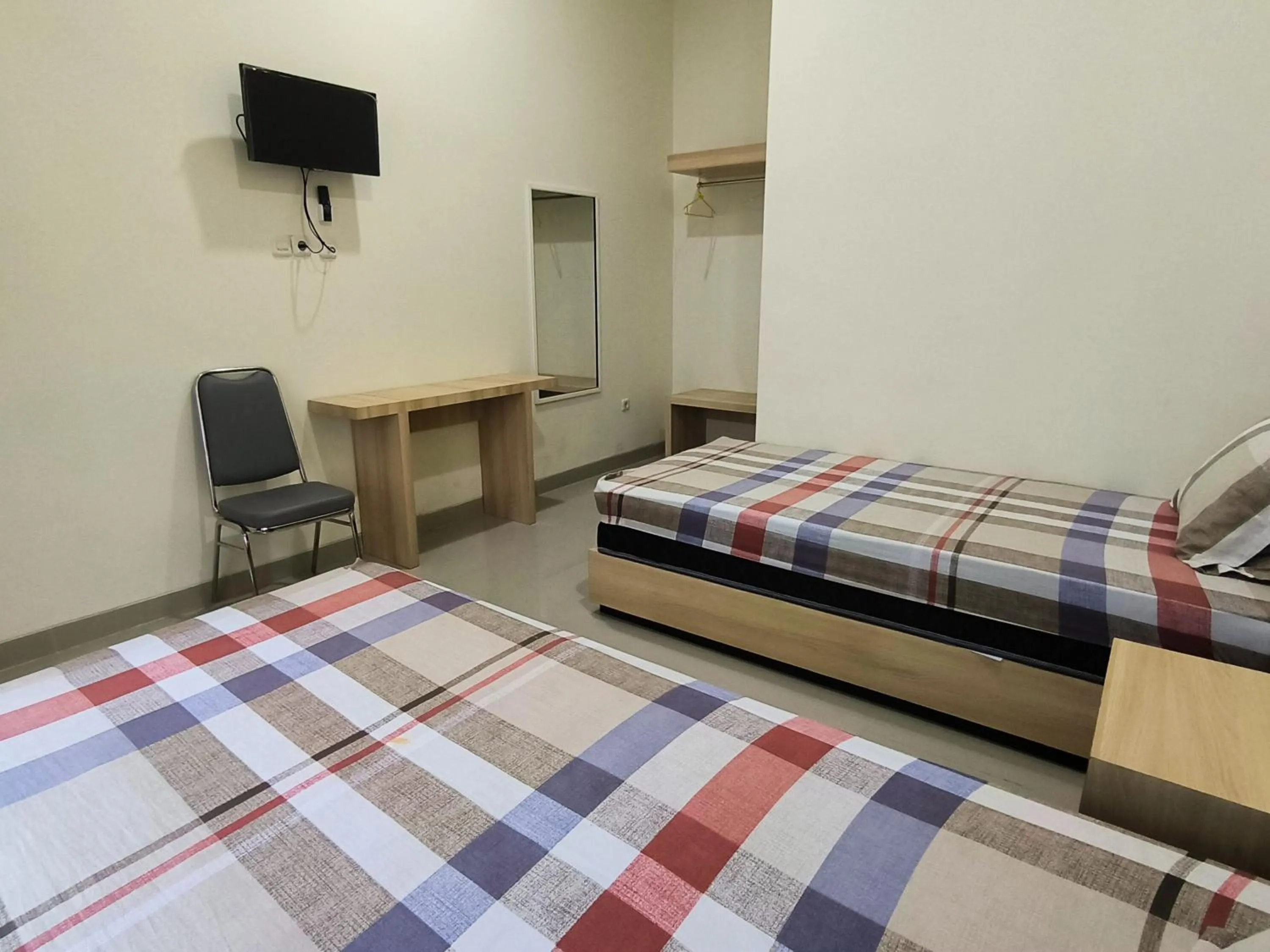 Bed in Tentrem Guesthouse Baru