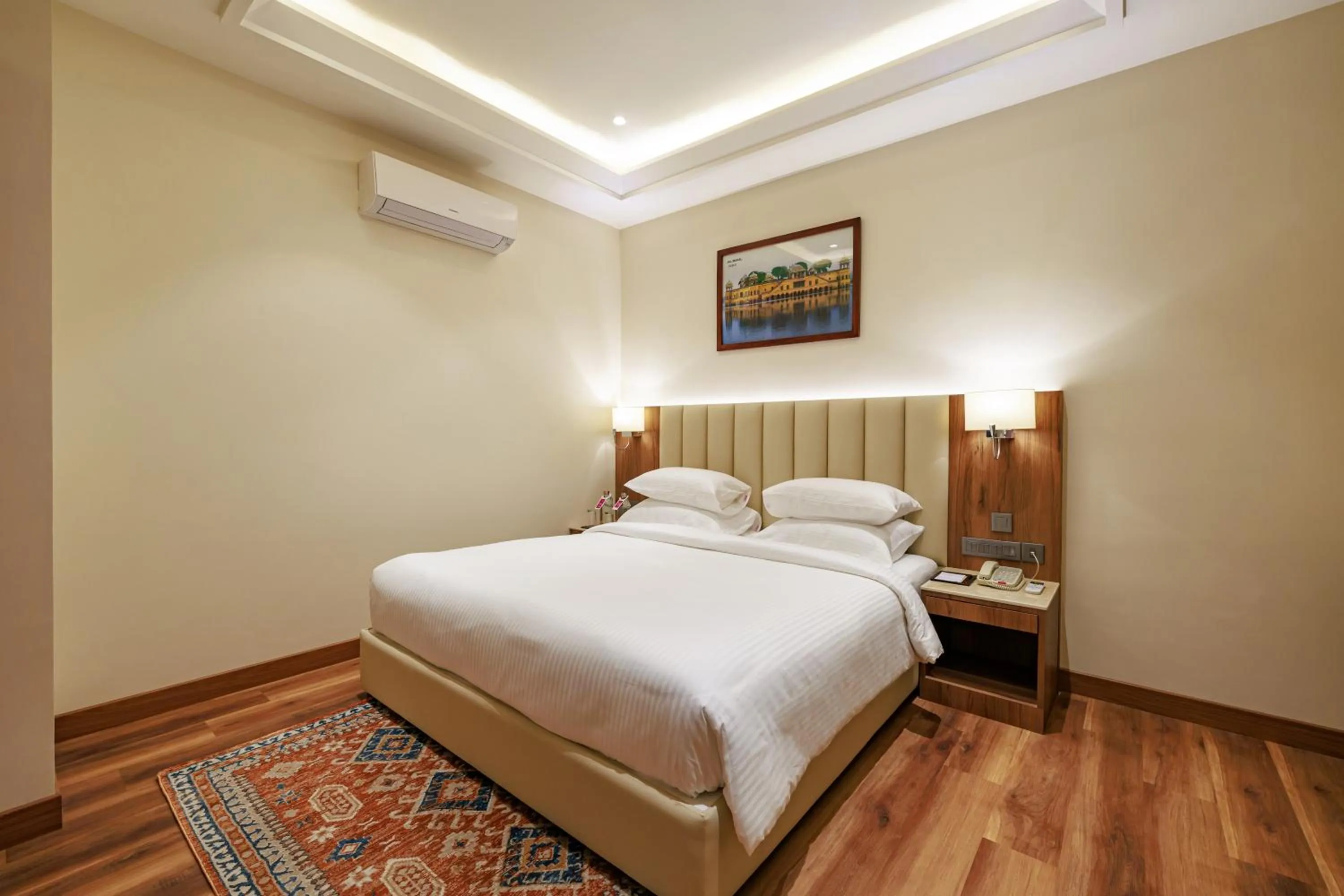 Bedroom, Bed in Regenta Place Jaipur Sirsi Road, Jaipur