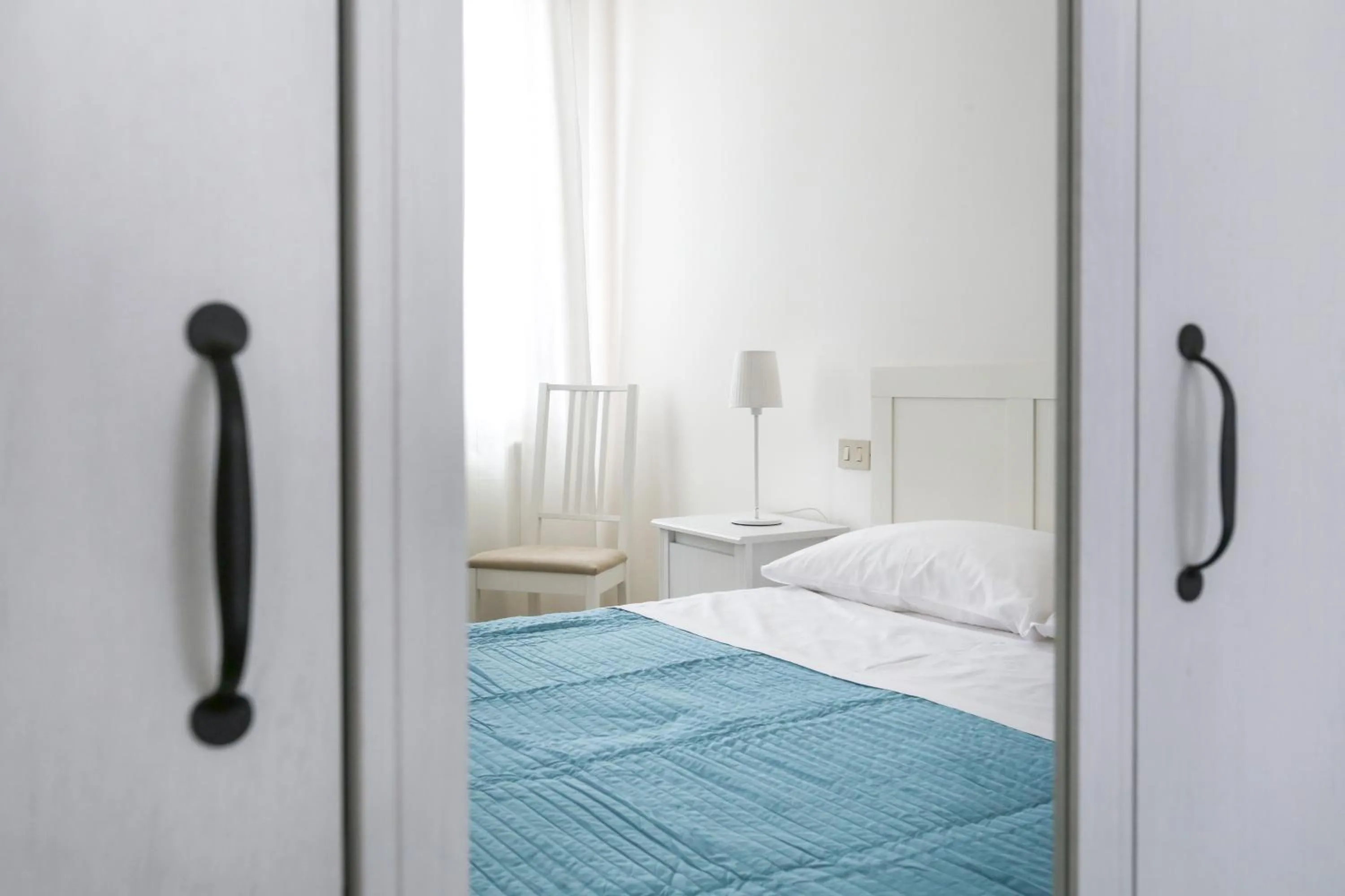 Photo of the whole room, Bed in Inlaguna