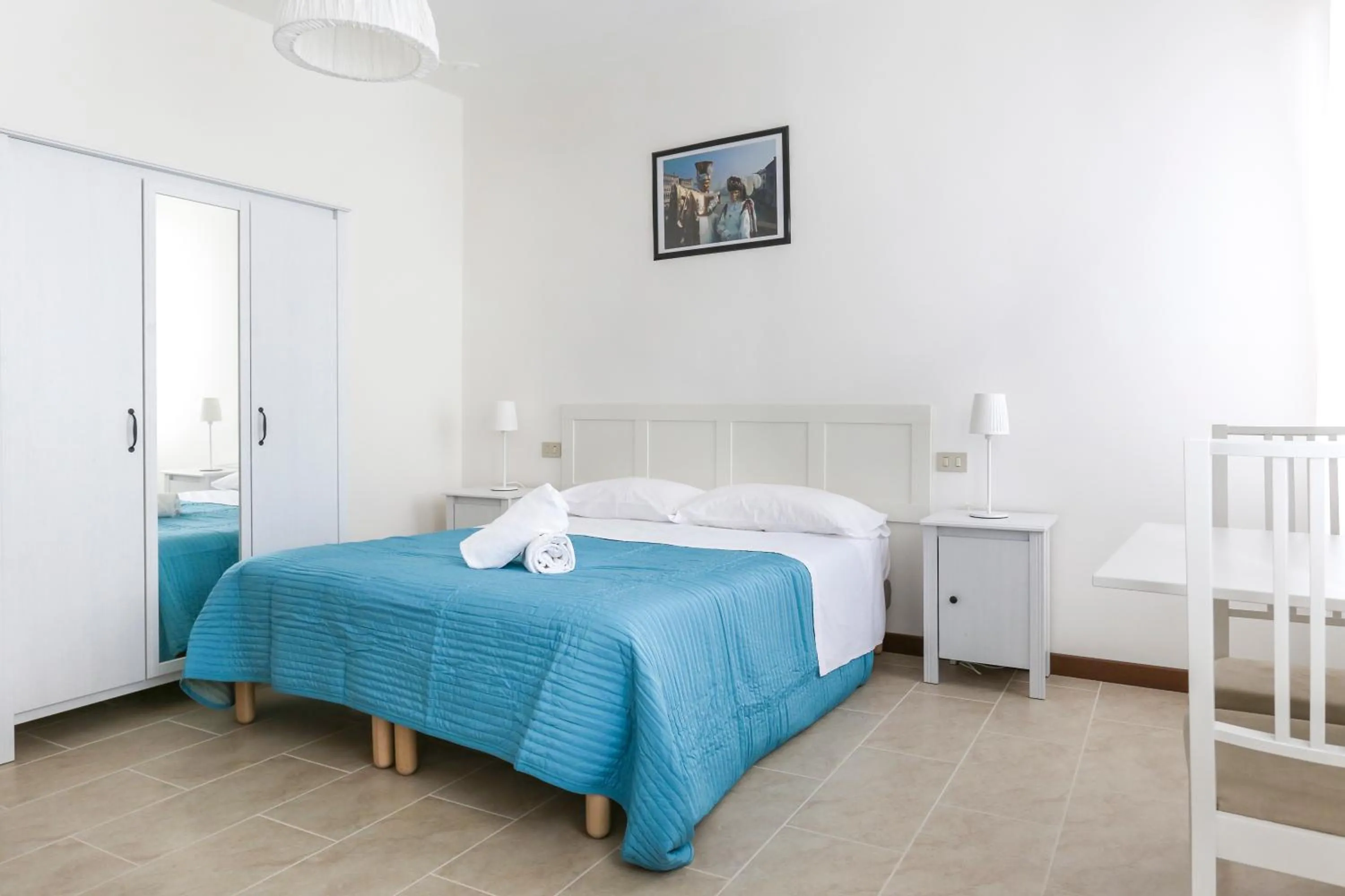 Photo of the whole room, Bed in Inlaguna