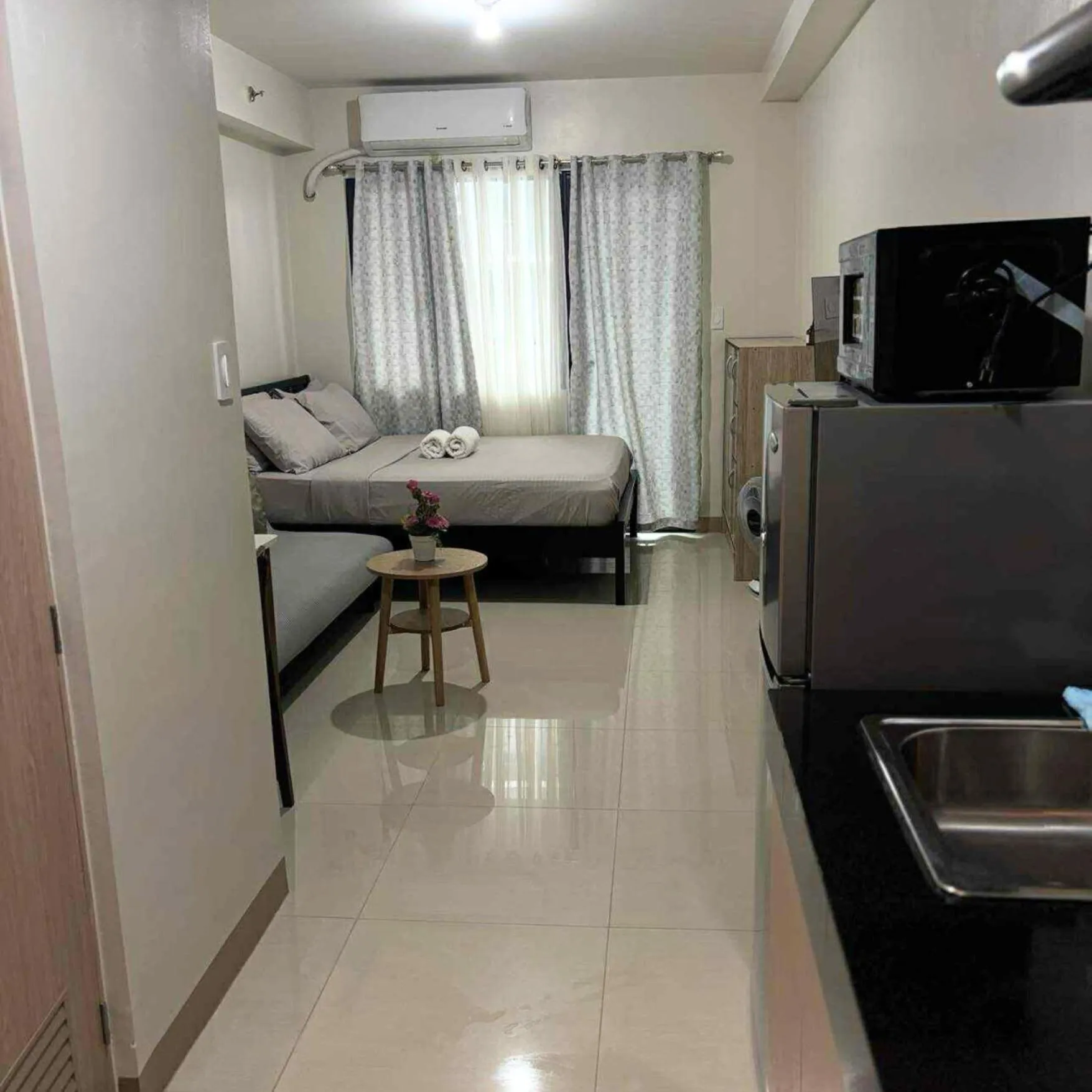 bunk bed, Bed in Studio apartment with balcony - Iloilo Condo Living