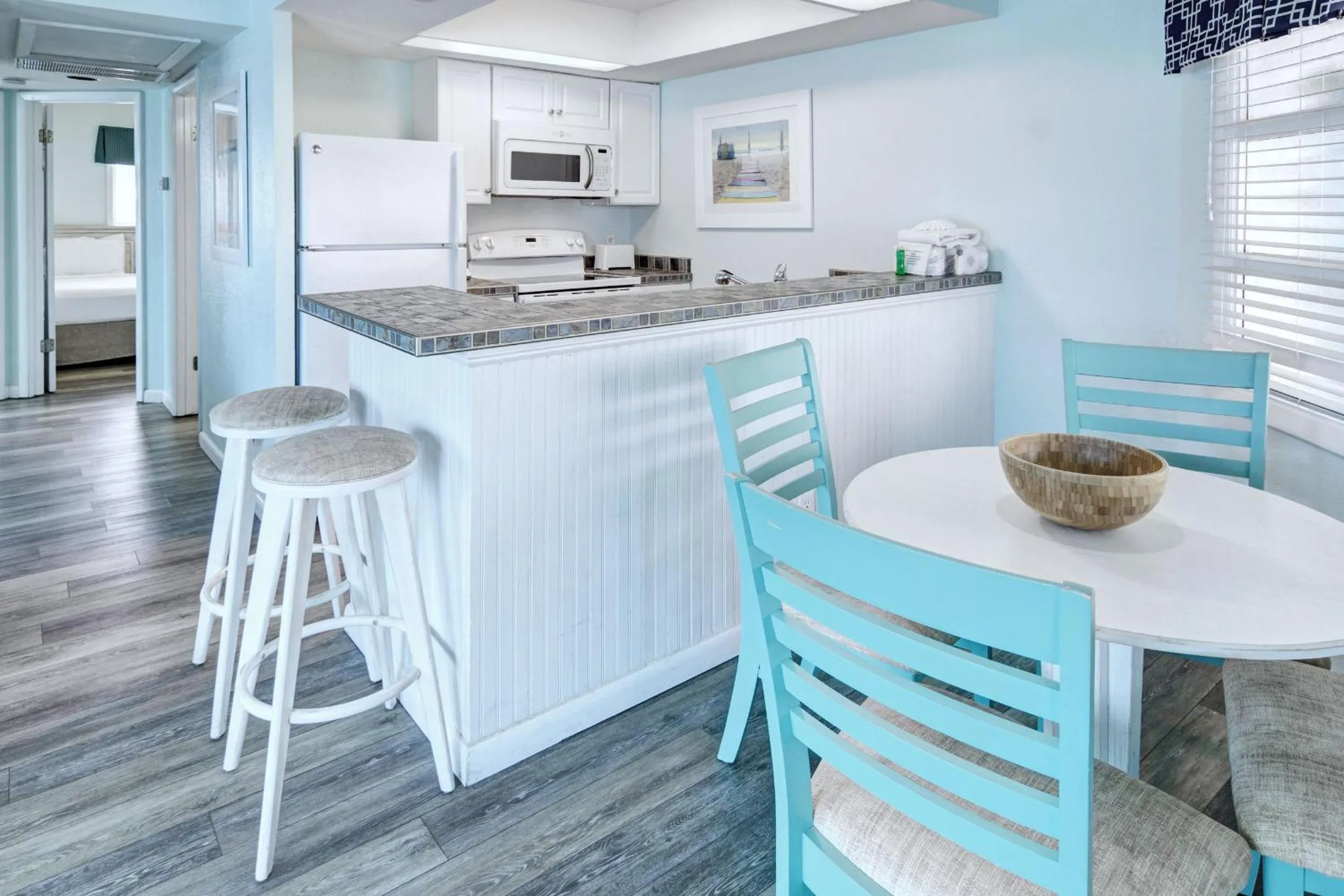 Dining area in New Smyrna Waves by Exploria Resorts