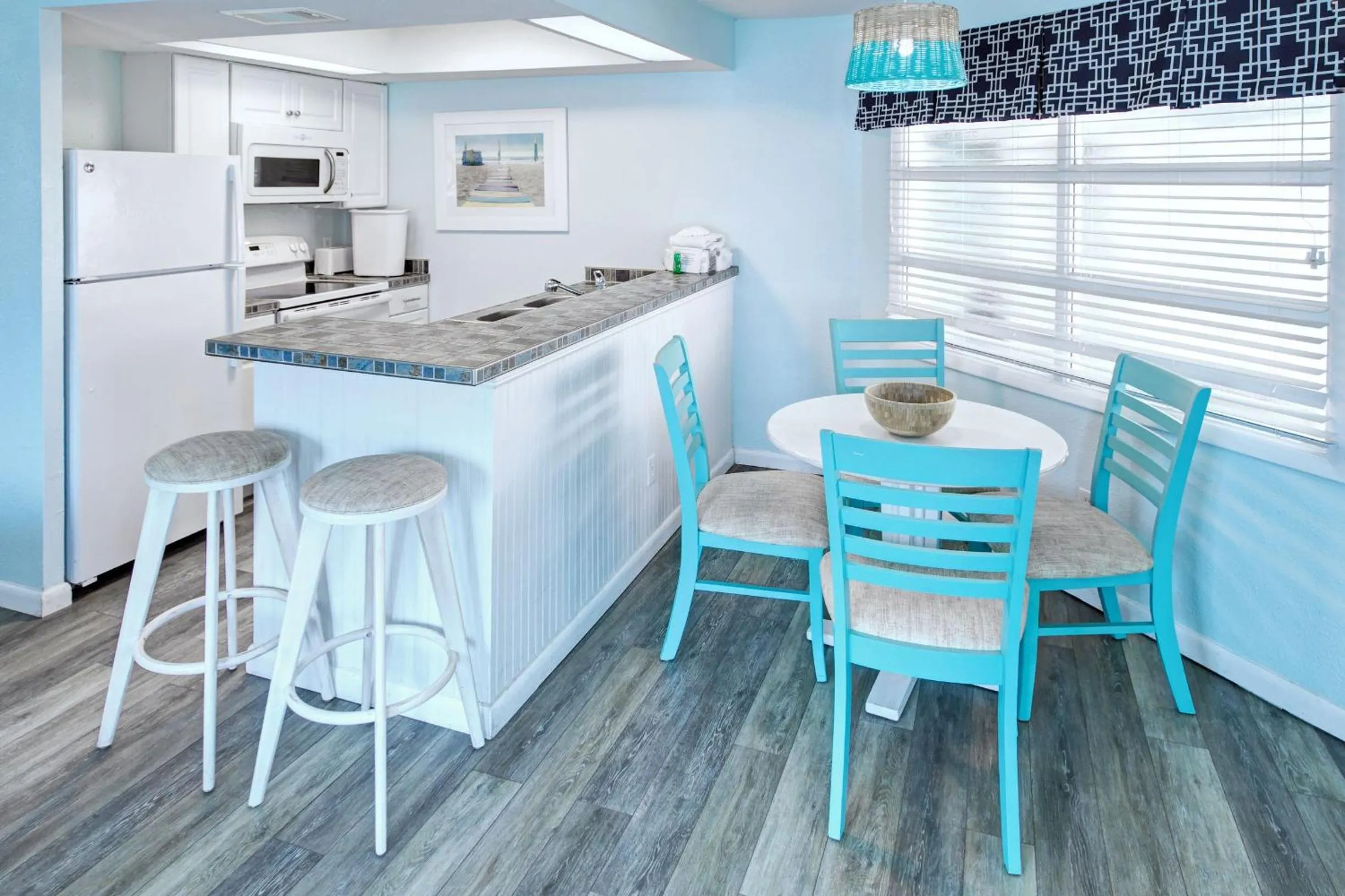Dining area in New Smyrna Waves by Exploria Resorts