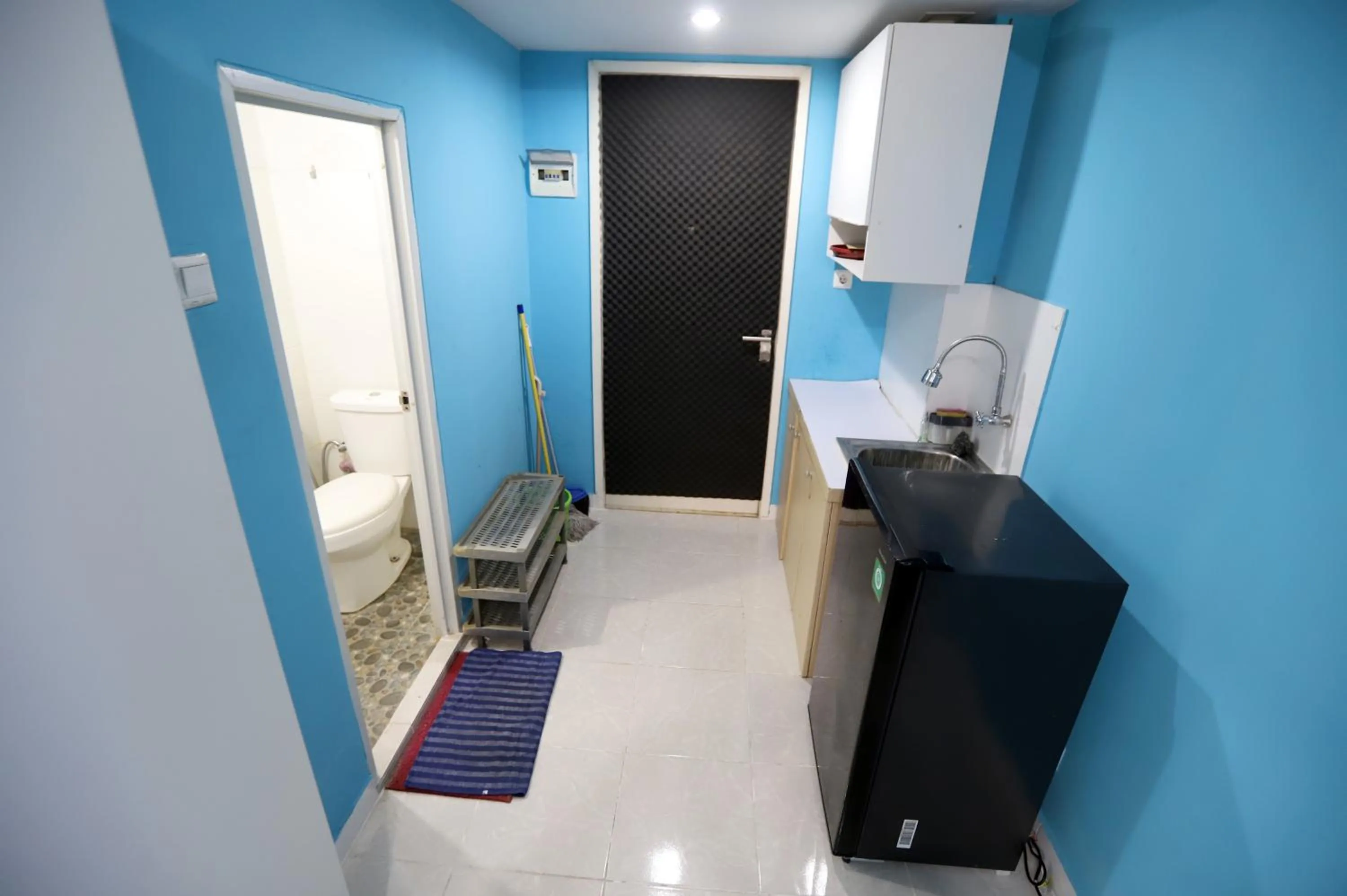 Kitchen or kitchenette in ARBA Dramaga Tower by Rendirooms