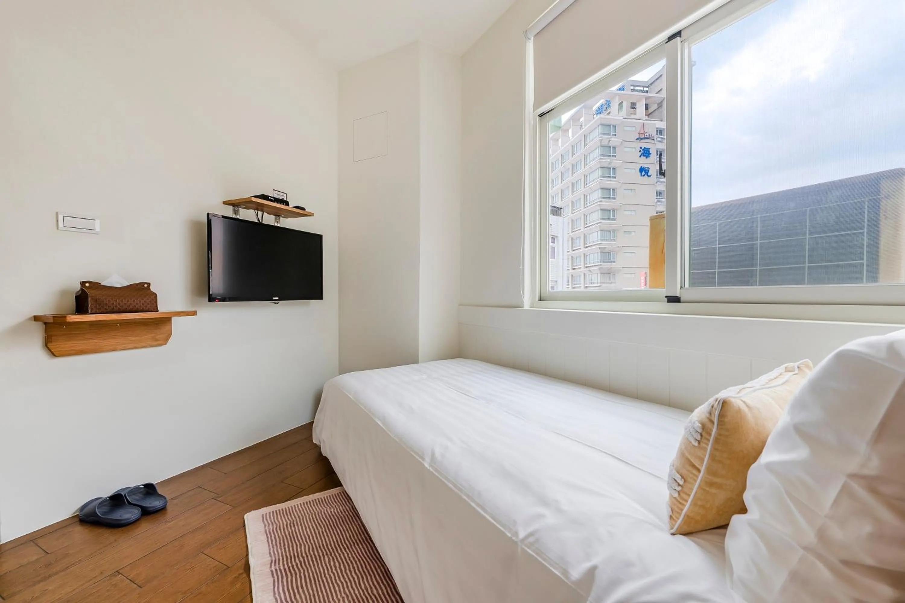 Bed in Penghu Chin Style Inn