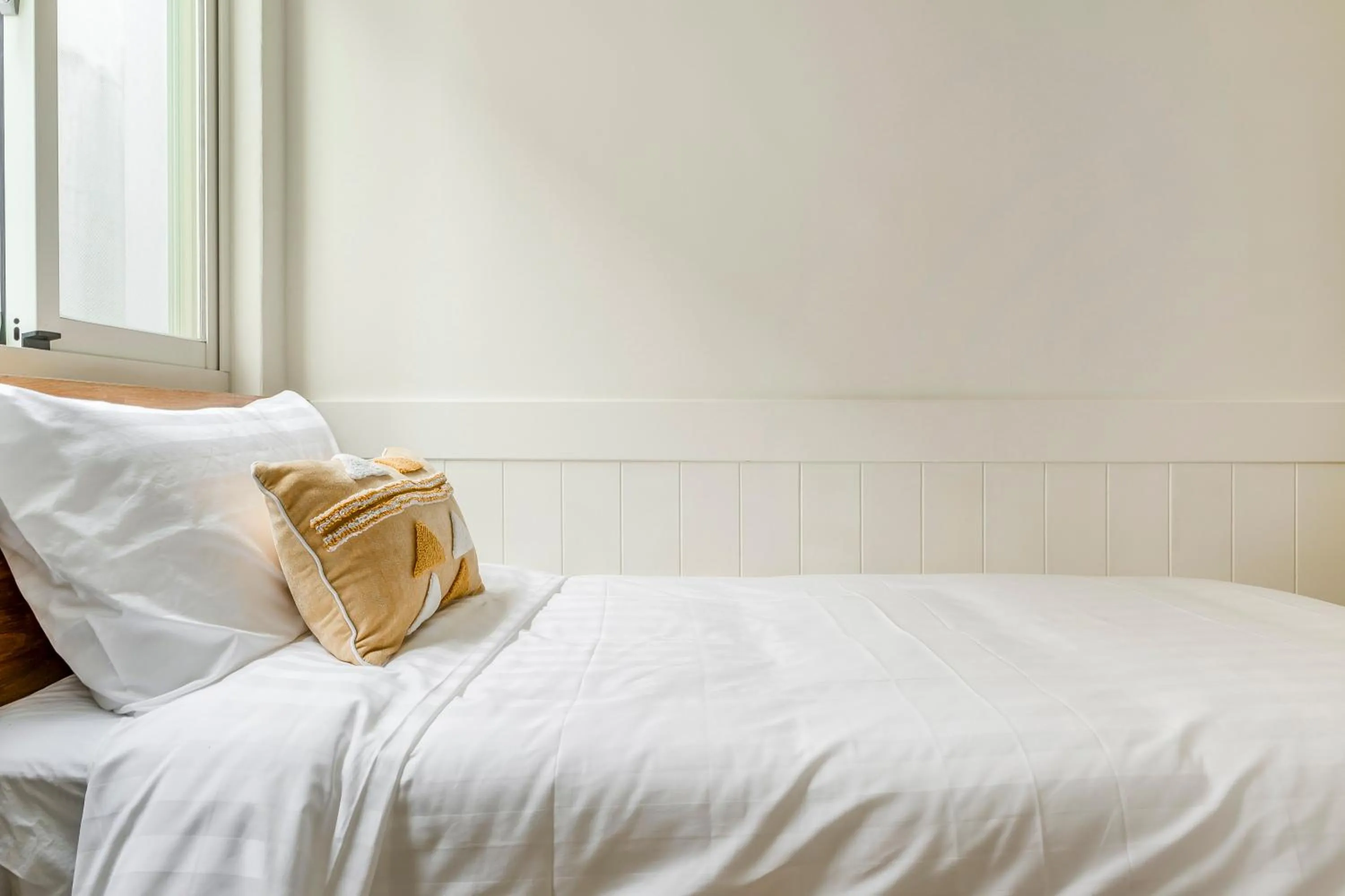 Bed in Penghu Chin Style Inn