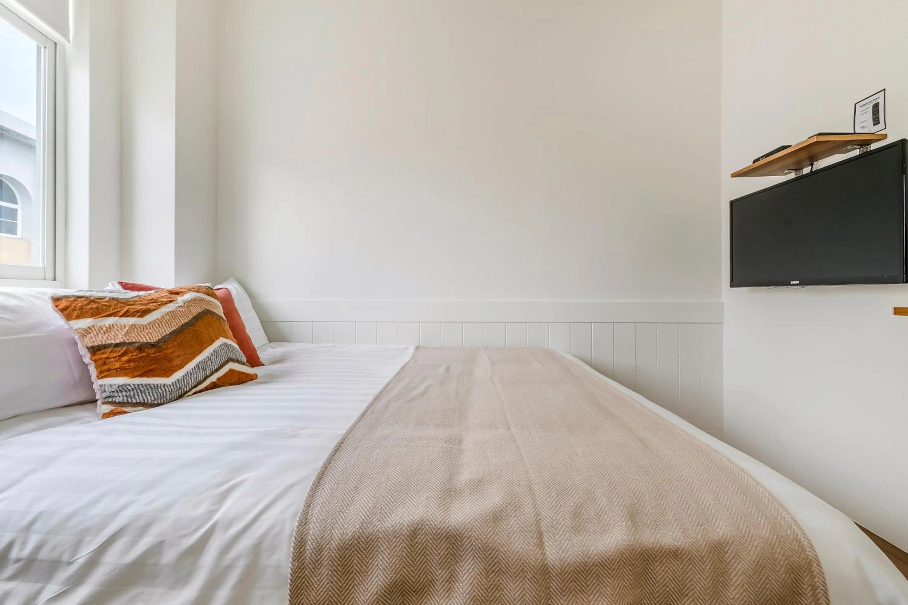 Bed in Penghu Chin Style Inn