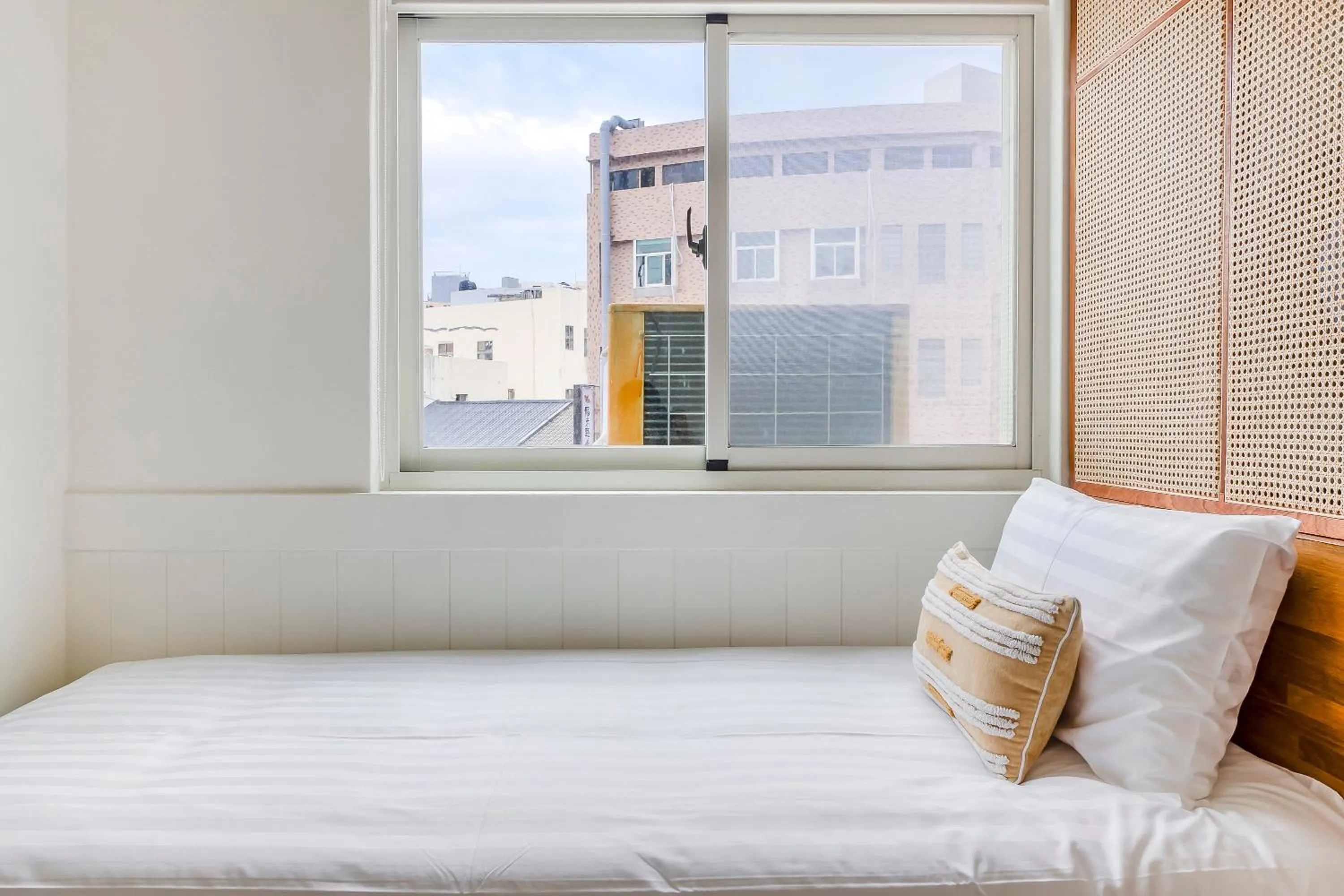 Bed in Penghu Chin Style Inn