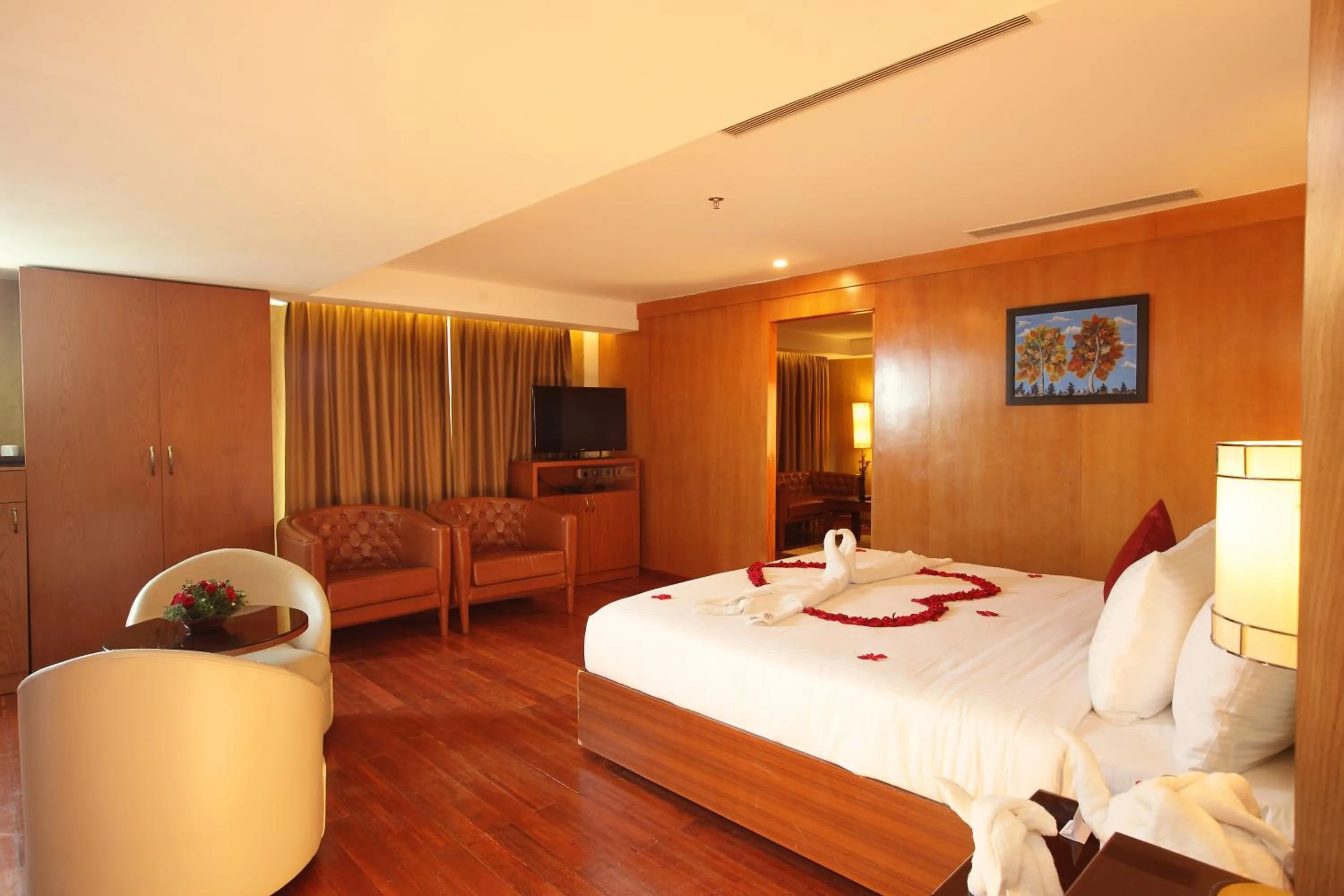 Bed in The Garuda Hotels