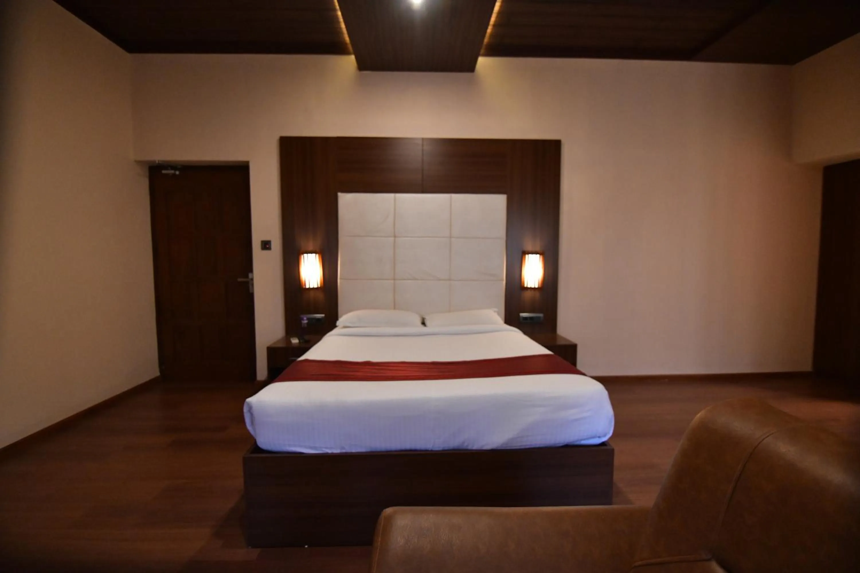 Bed in The Garuda Hotels