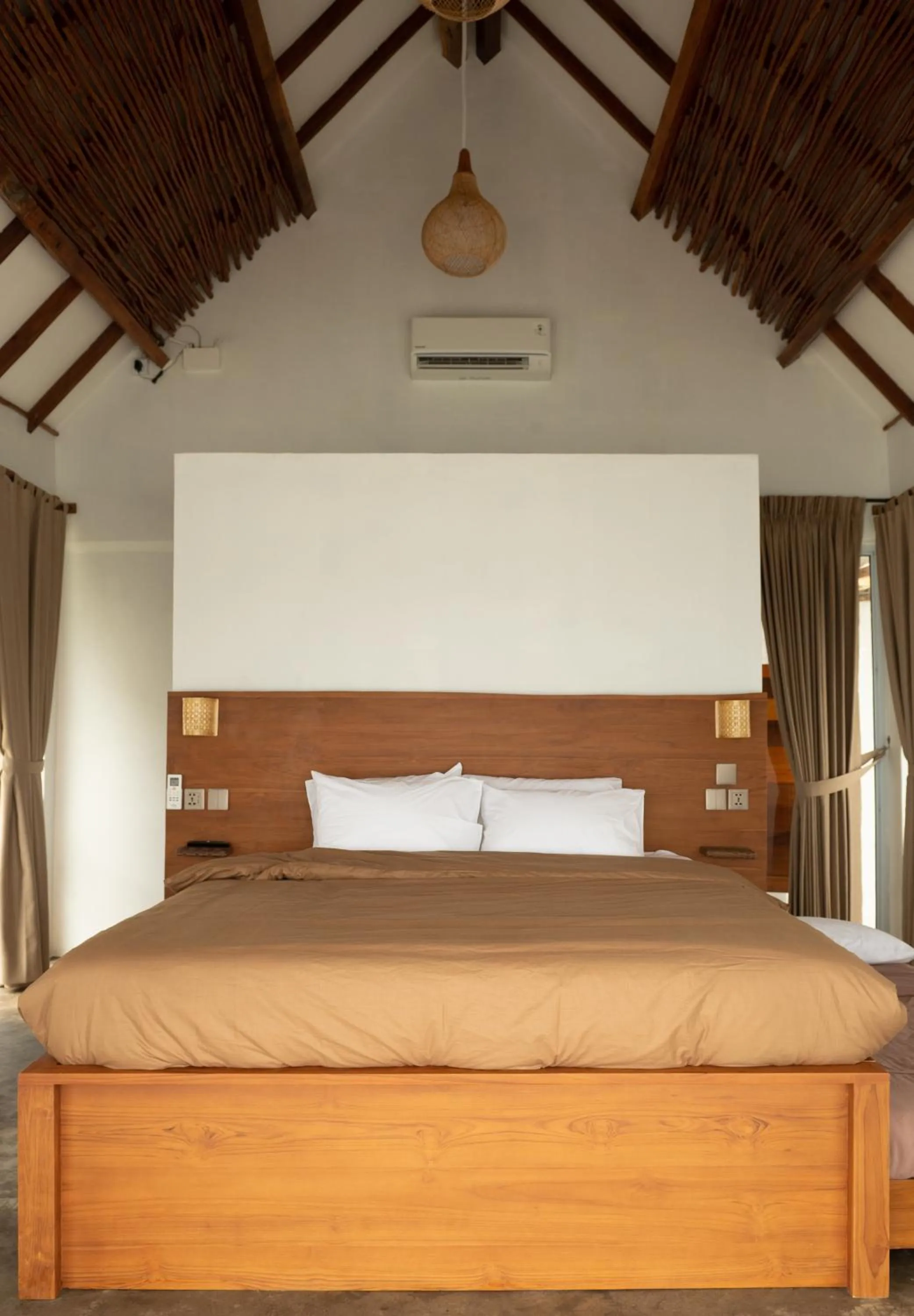 Bed in Sadi Beach House