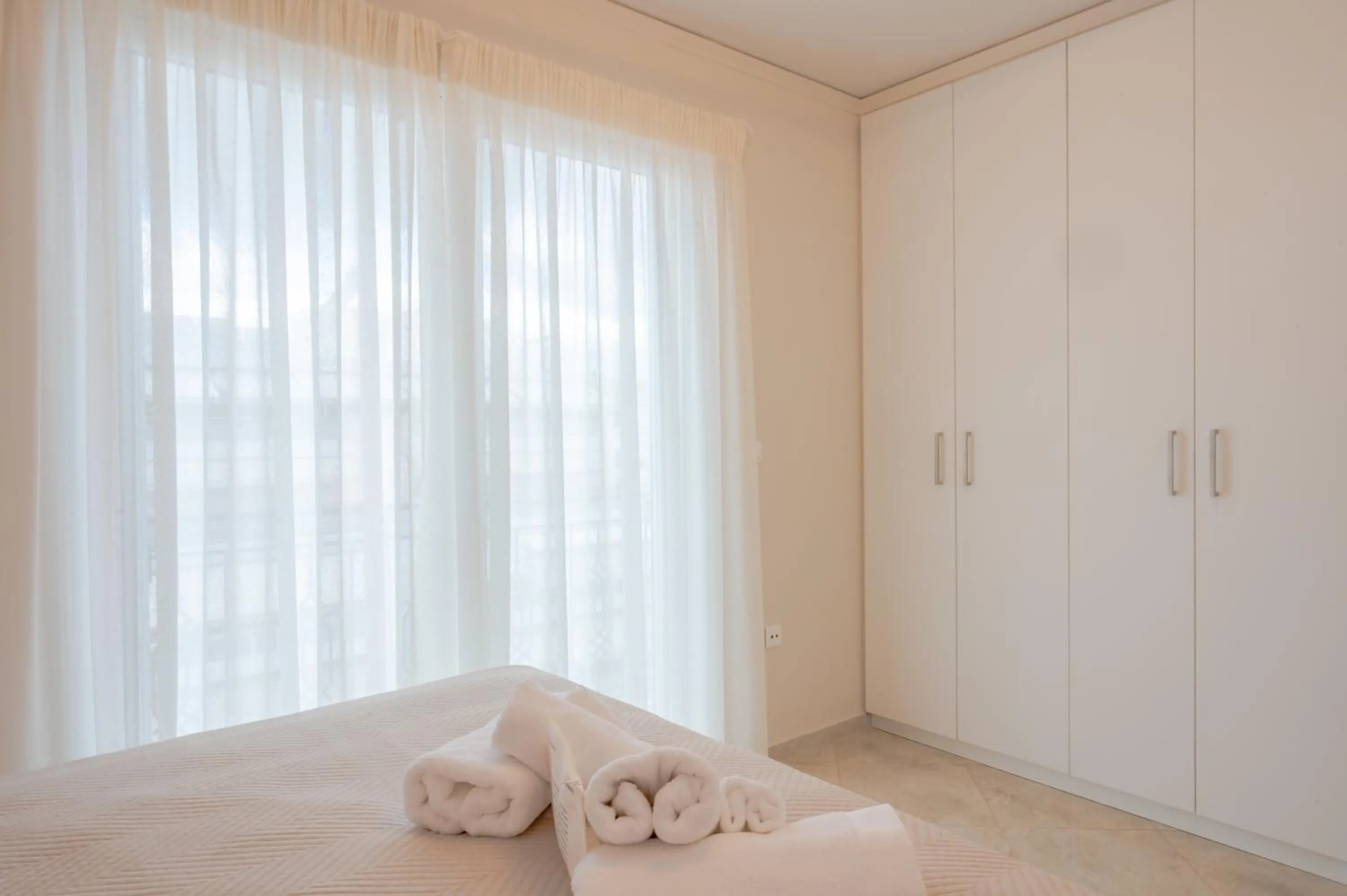 Bed in Apeiron Athena Residences