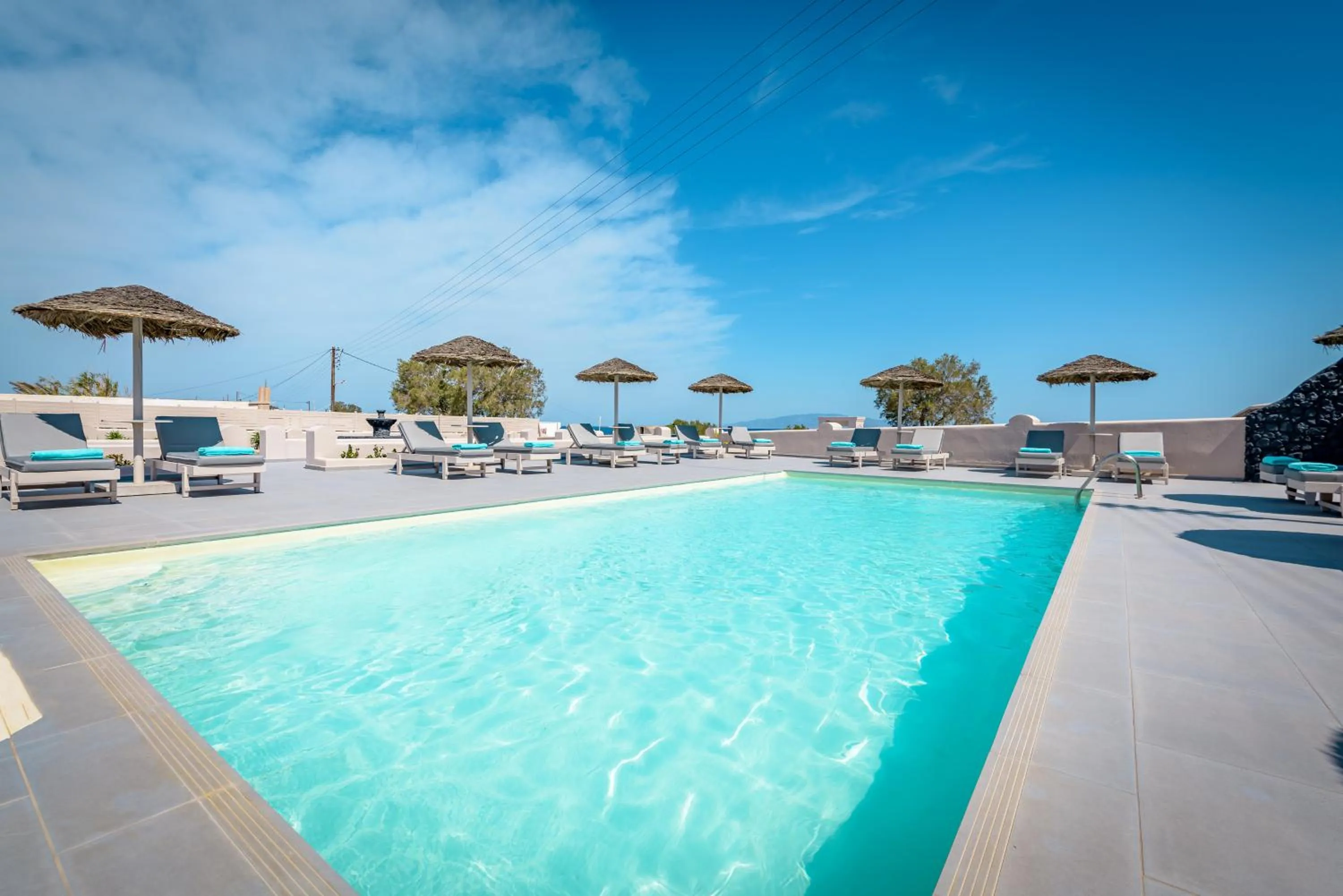 Swimming pool in En Plo Boutique Suites