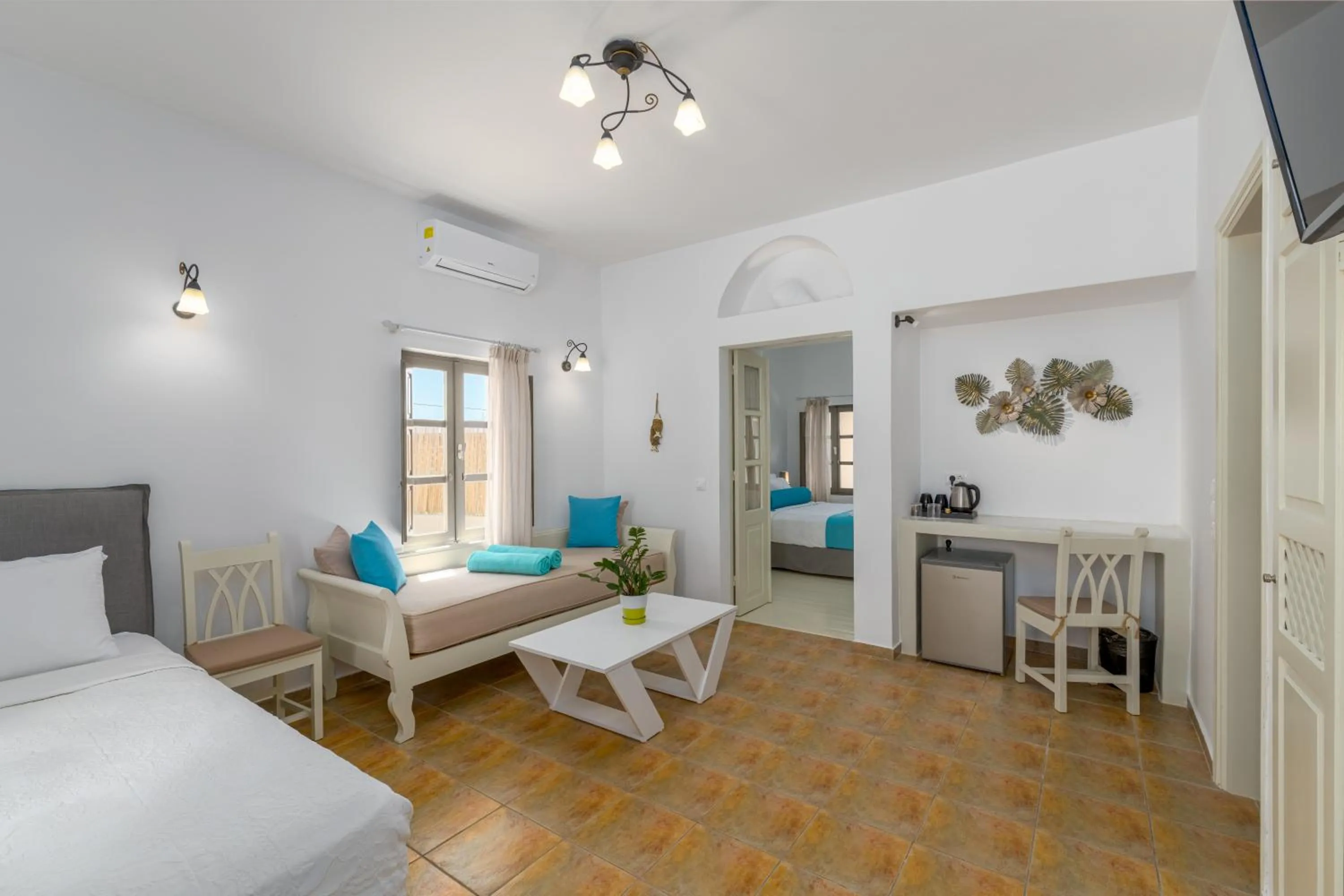 Bed in En Plo Boutique Suites