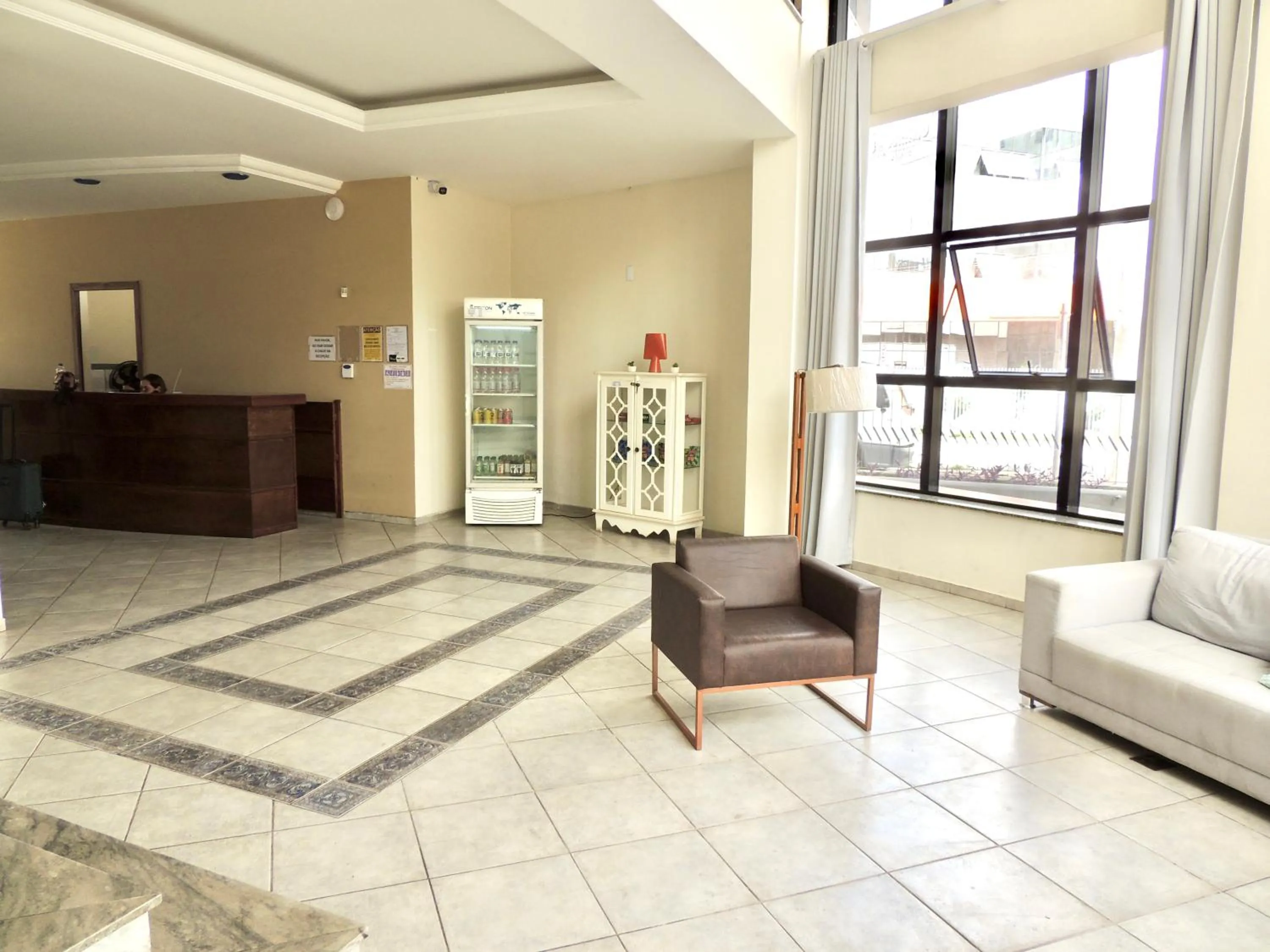 Lobby or reception in Pouso Alegre Hotel